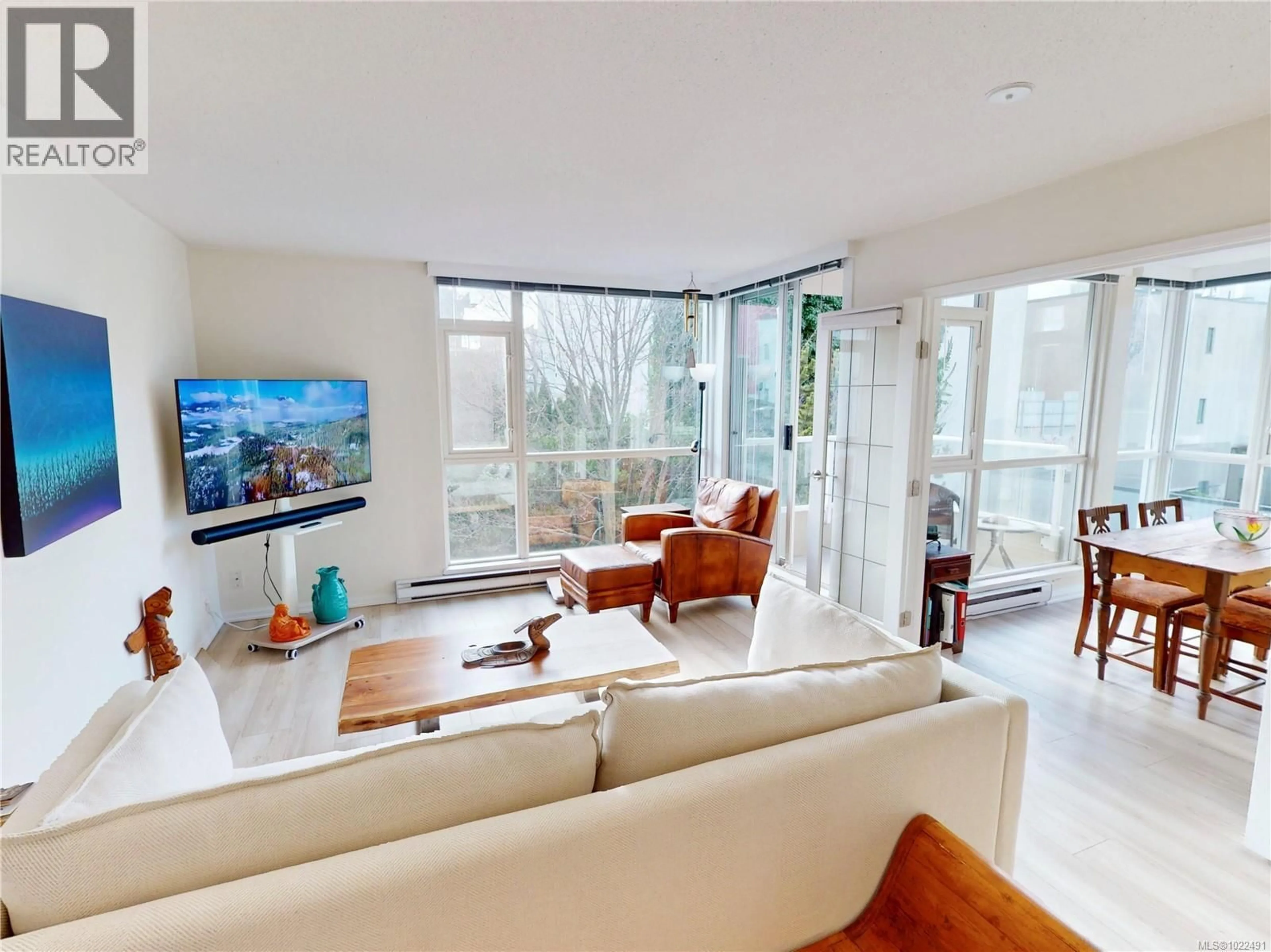 Living room with furniture, unknown for 312 - 835 VIEW STREET, Victoria British Columbia V8W3W8