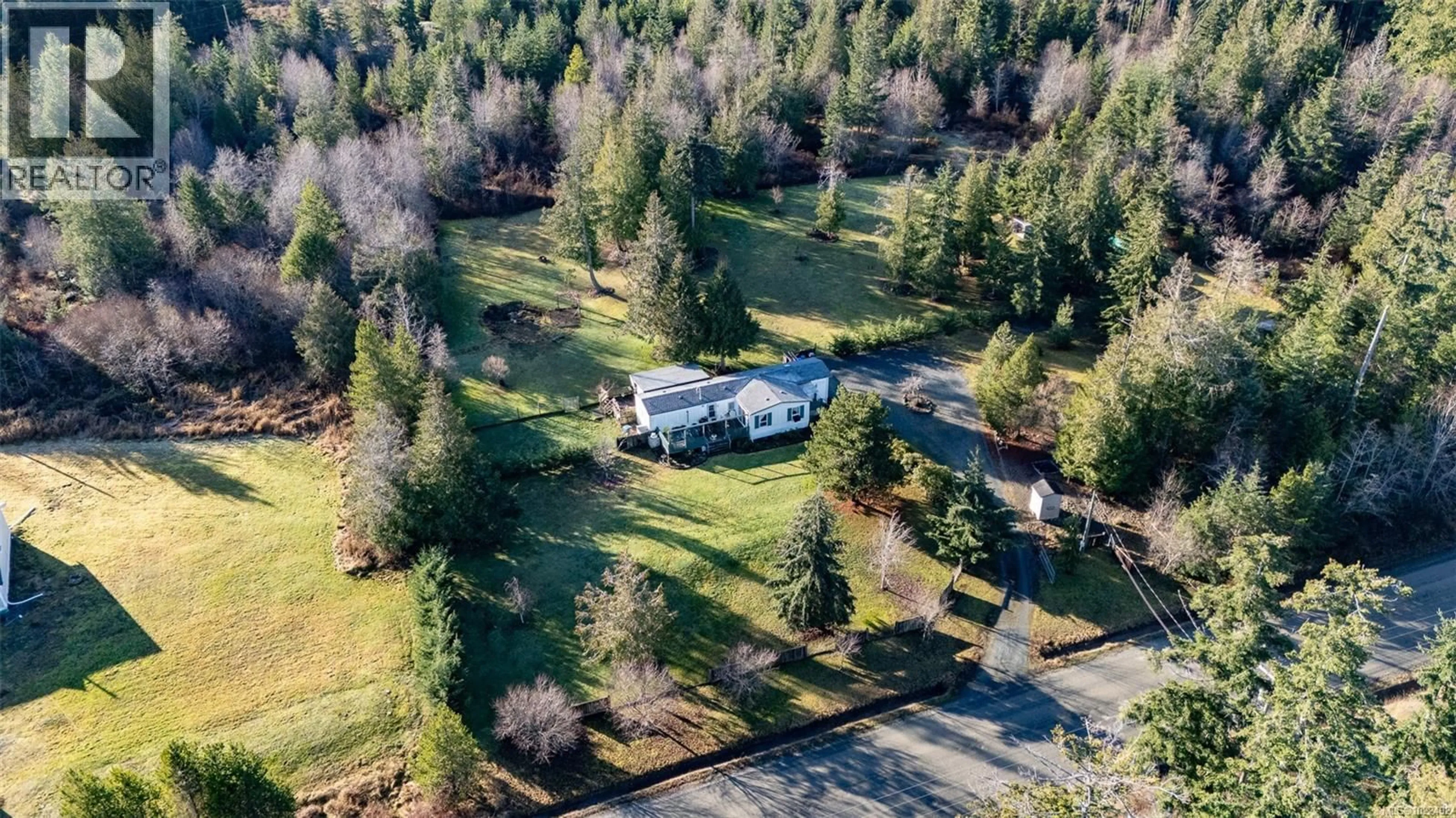 A pic from outside/outdoor area/front of a property/back of a property/a pic from drone, forest/trees view for 2450/2440 WHISTLER ROAD WEST, Qualicum Beach British Columbia V9K2A6
