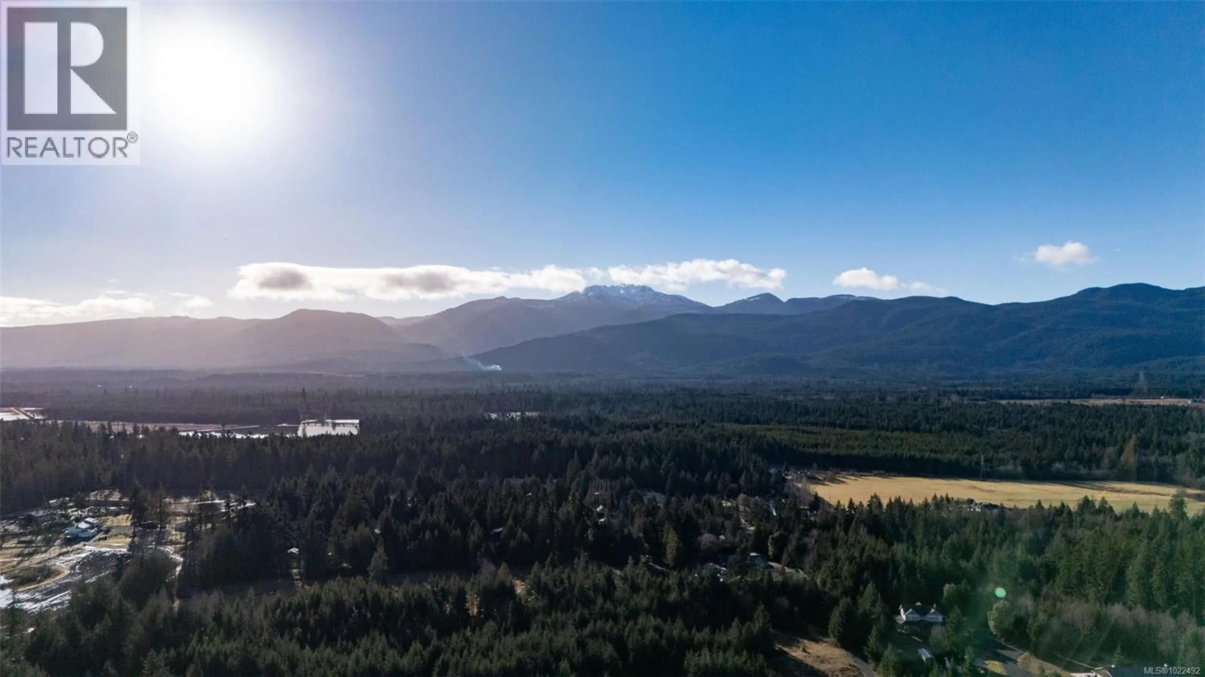 A pic from outside/outdoor area/front of a property/back of a property/a pic from drone, mountain view for 2450/2440 WHISTLER ROAD WEST, Qualicum Beach British Columbia V9K2A6