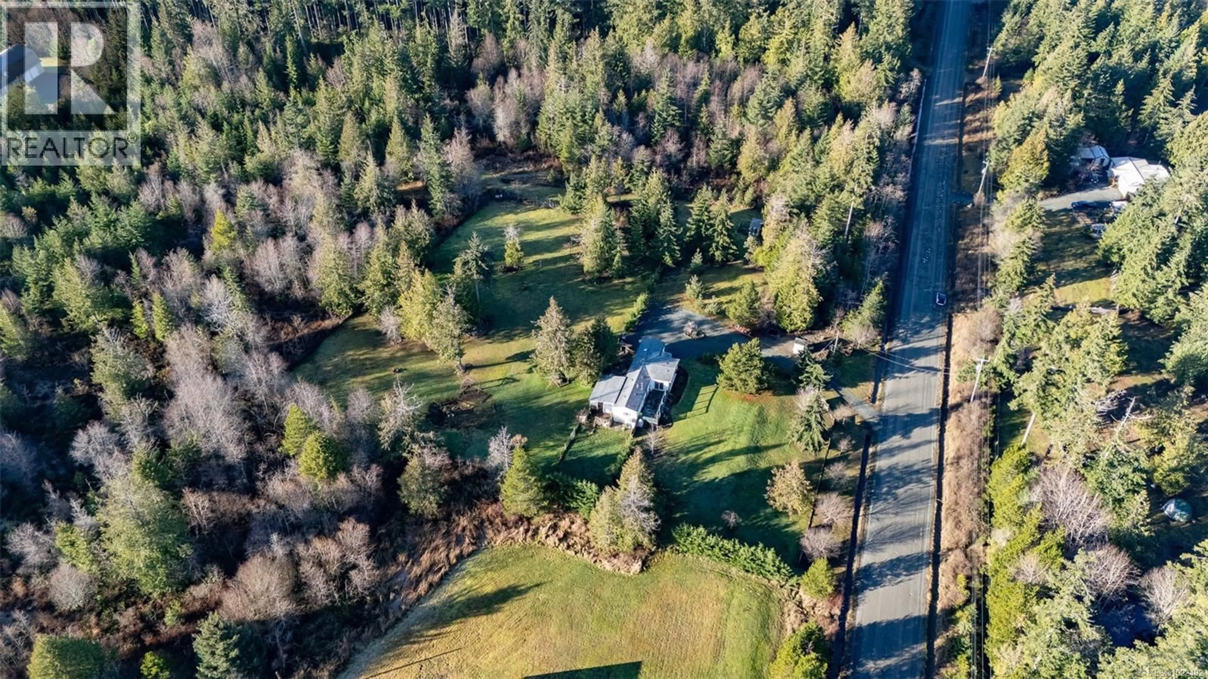 A pic from outside/outdoor area/front of a property/back of a property/a pic from drone, forest/trees view for 2450/2440 WHISTLER ROAD WEST, Qualicum Beach British Columbia V9K2A6