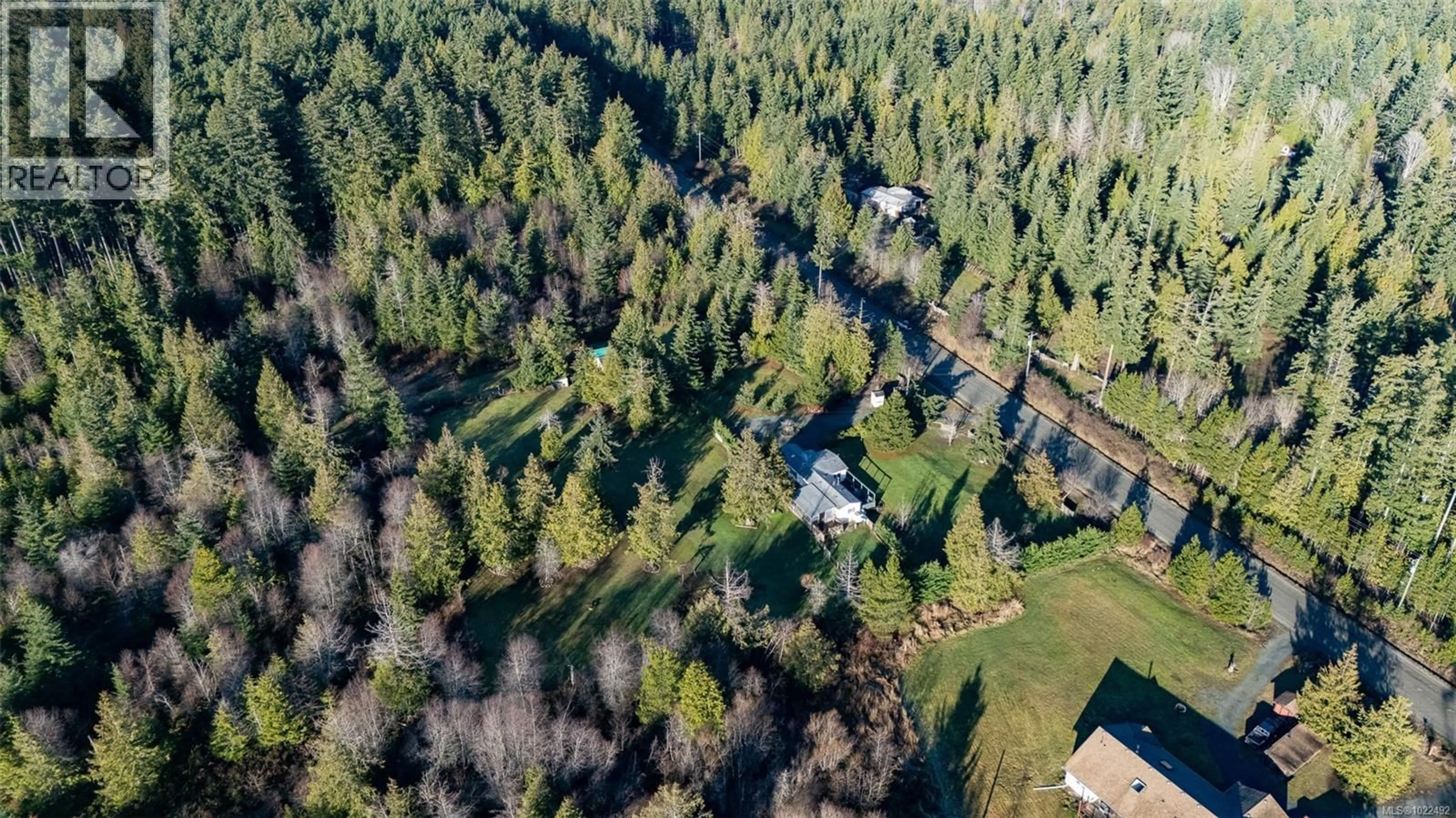 A pic from outside/outdoor area/front of a property/back of a property/a pic from drone, forest/trees view for 2450/2440 WHISTLER ROAD WEST, Qualicum Beach British Columbia V9K2A6