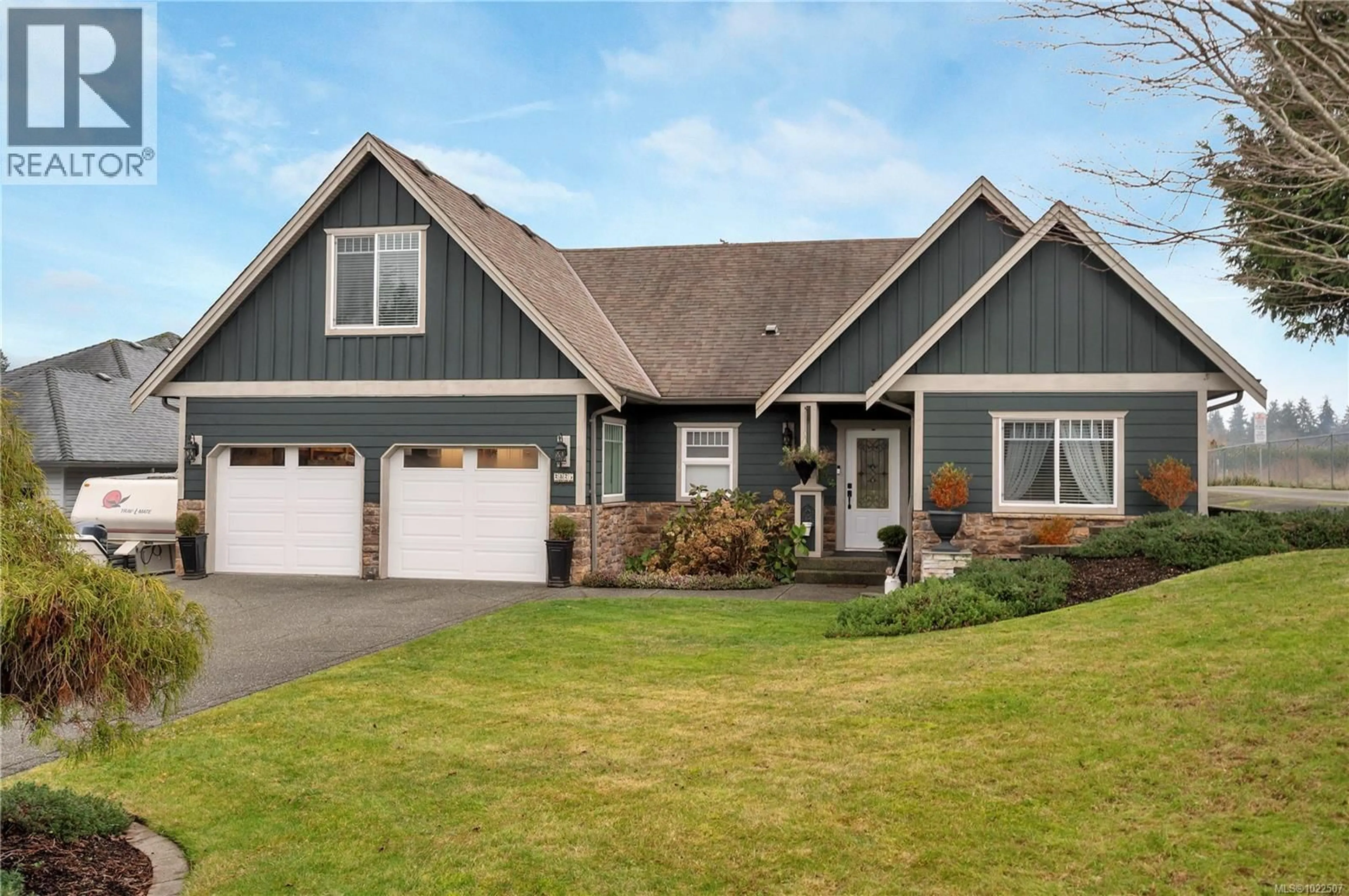 Home with vinyl exterior material, street for 2825 DENMAN STREET, Campbell River British Columbia V9H1S9