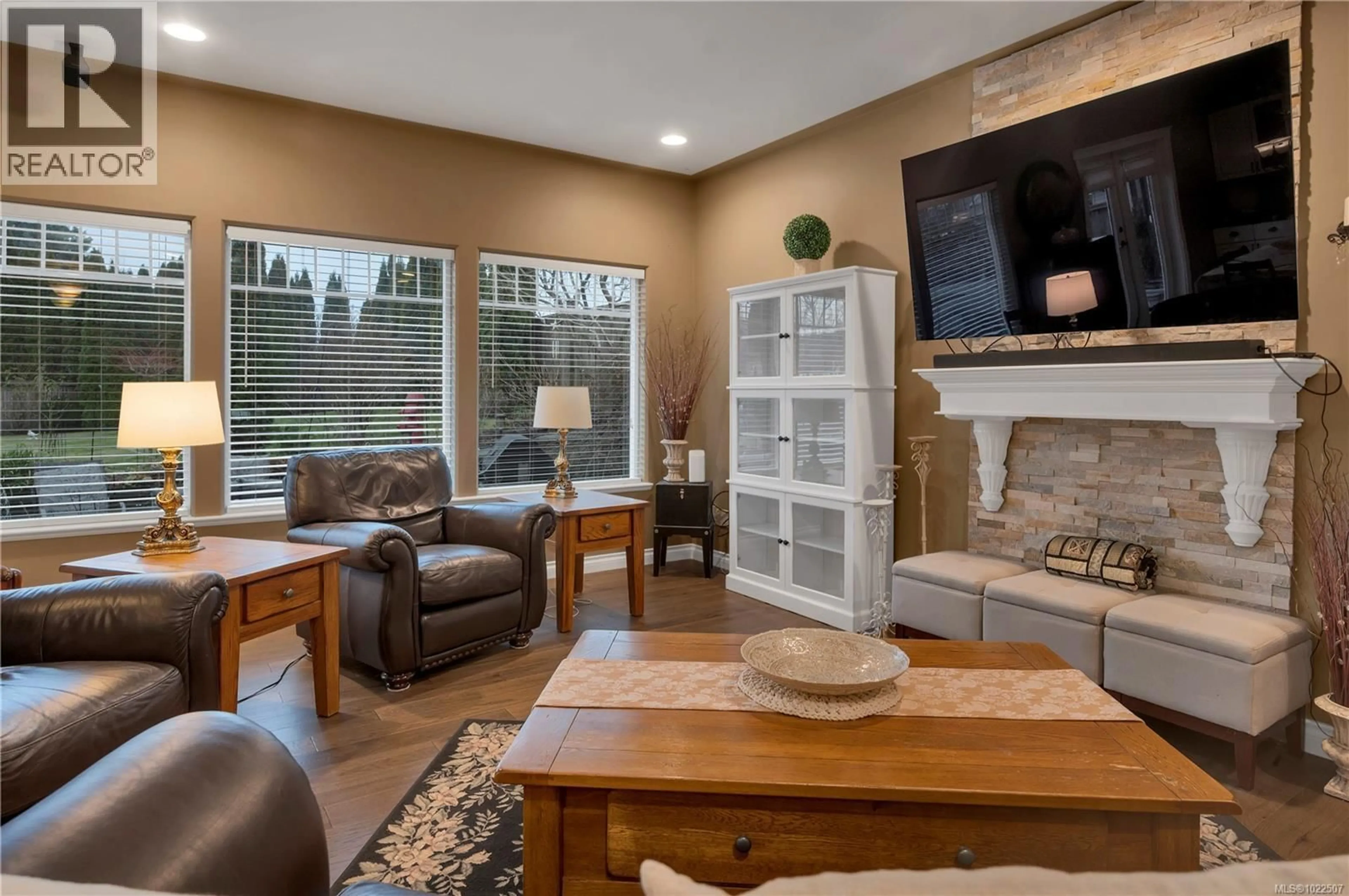 Living room with furniture, ceramic/tile floor for 2825 DENMAN STREET, Campbell River British Columbia V9H1S9