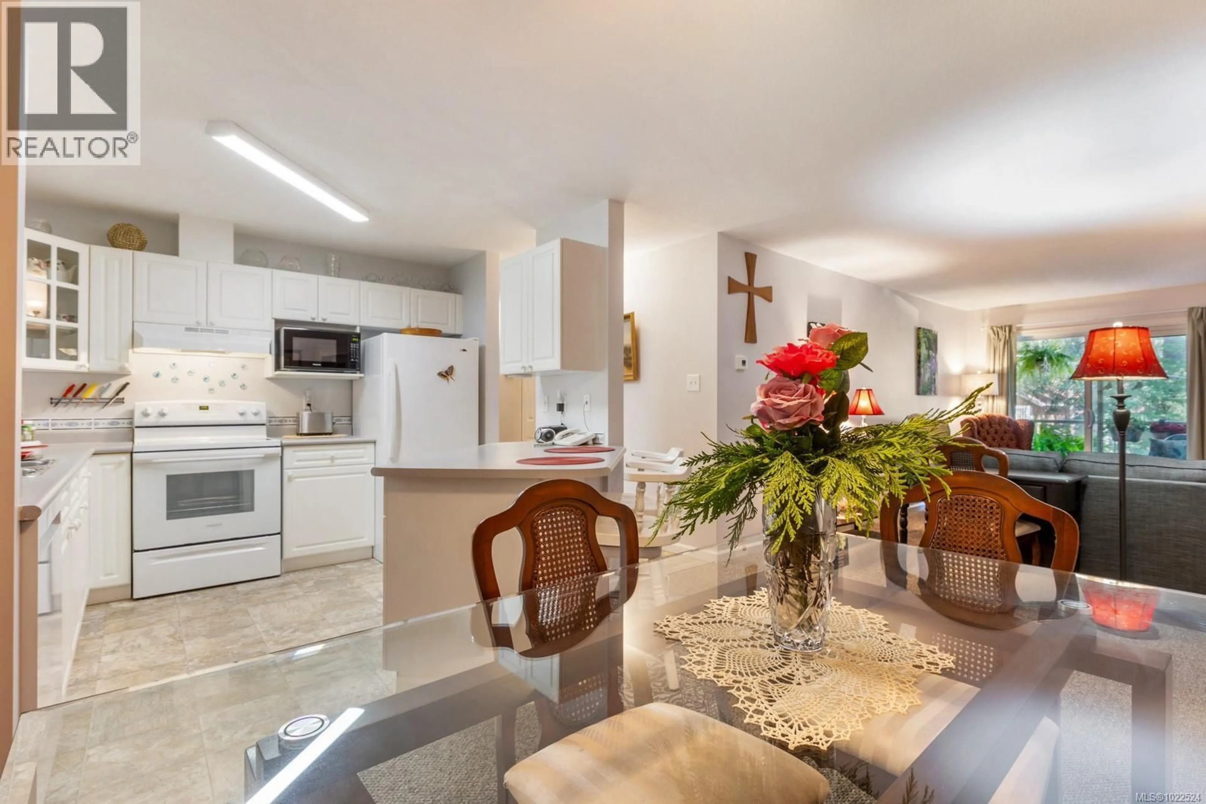 Open concept kitchen, ceramic/tile floor for 206 - 1970 COMOX AVENUE, Comox British Columbia V9M3M7