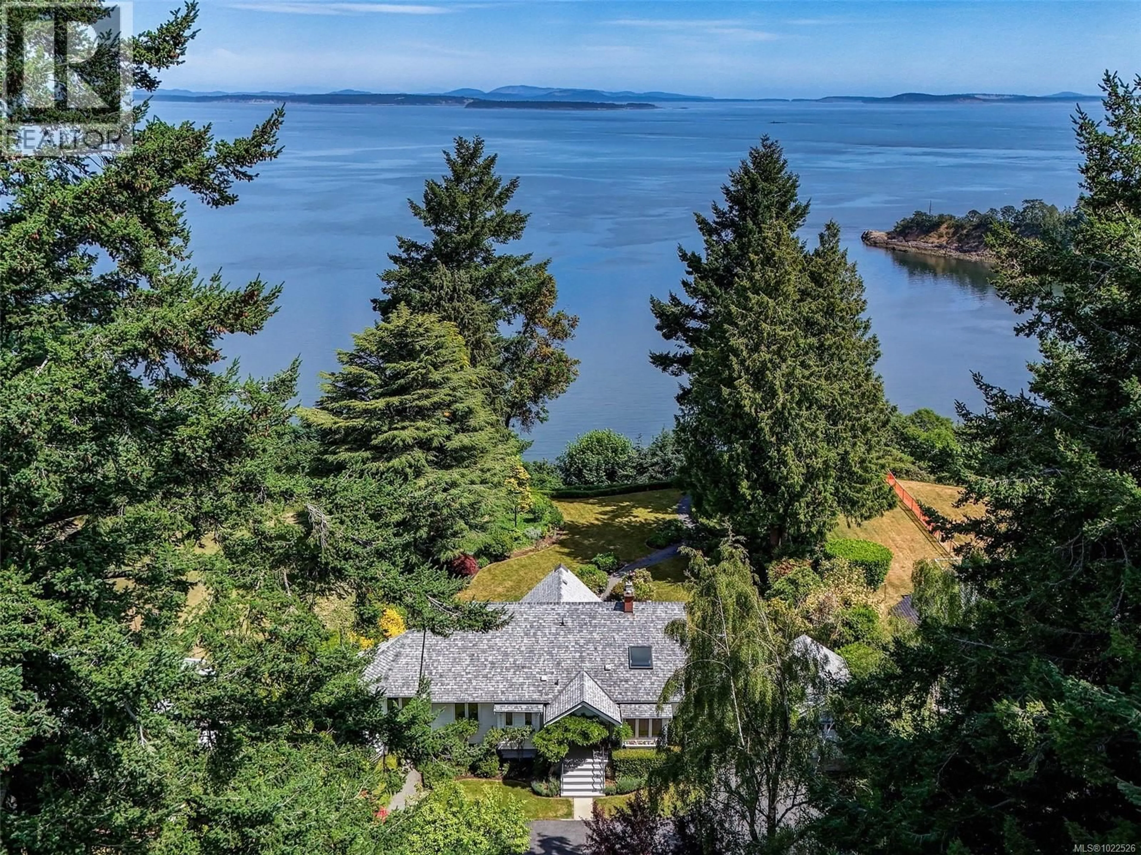 A pic from outside/outdoor area/front of a property/back of a property/a pic from drone, water/lake/river/ocean view for 4590 TORQUAY DRIVE, Saanich British Columbia V8N3L7