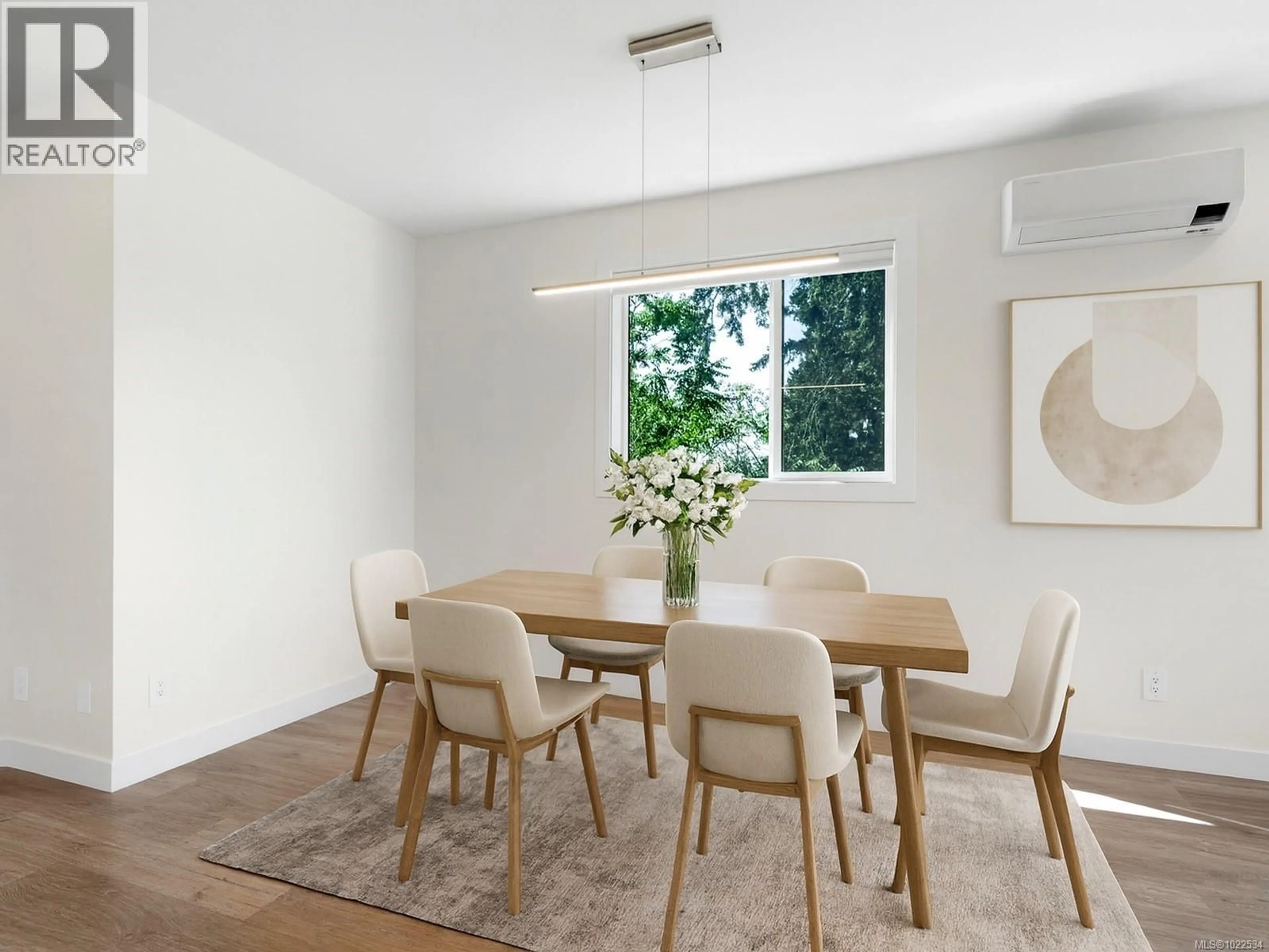 Dining room, wood/laminate floor for 110 - 3559 VISION WAY, Langford British Columbia V9C0C4