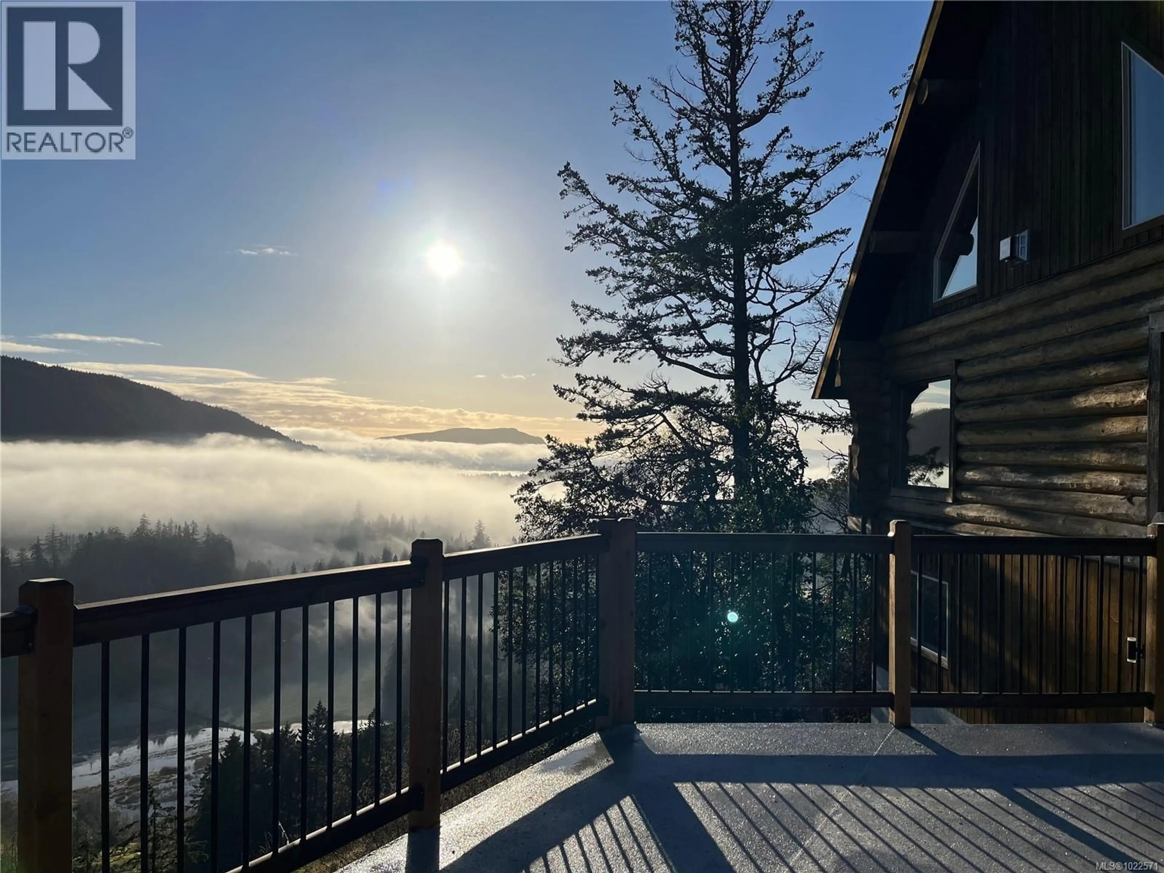 A pic from outside/outdoor area/front of a property/back of a property/a pic from drone, mountain view for 8030 TRANS CANADA HIGHWAY, Duncan British Columbia V9L3R9