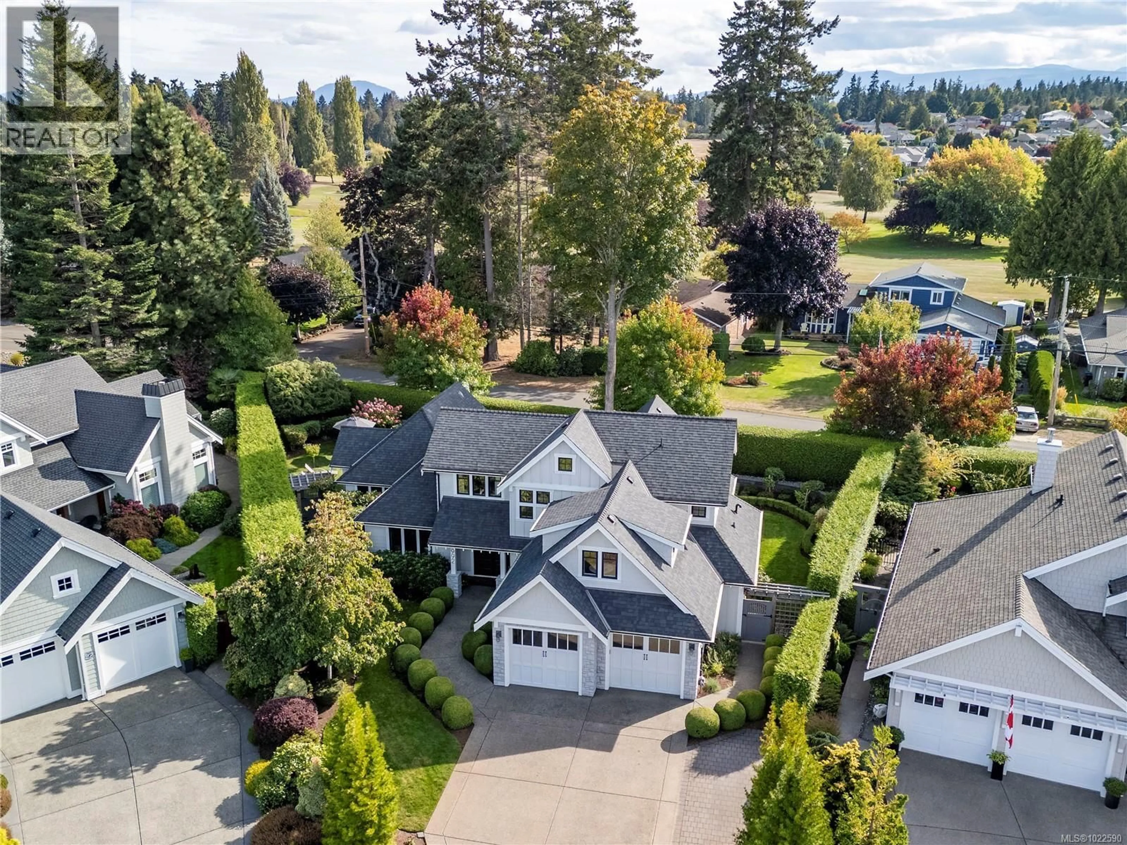 A pic from outside/outdoor area/front of a property/back of a property/a pic from drone, unknown for 992 BLUFFS DRIVE, Qualicum Beach British Columbia V9K0A2