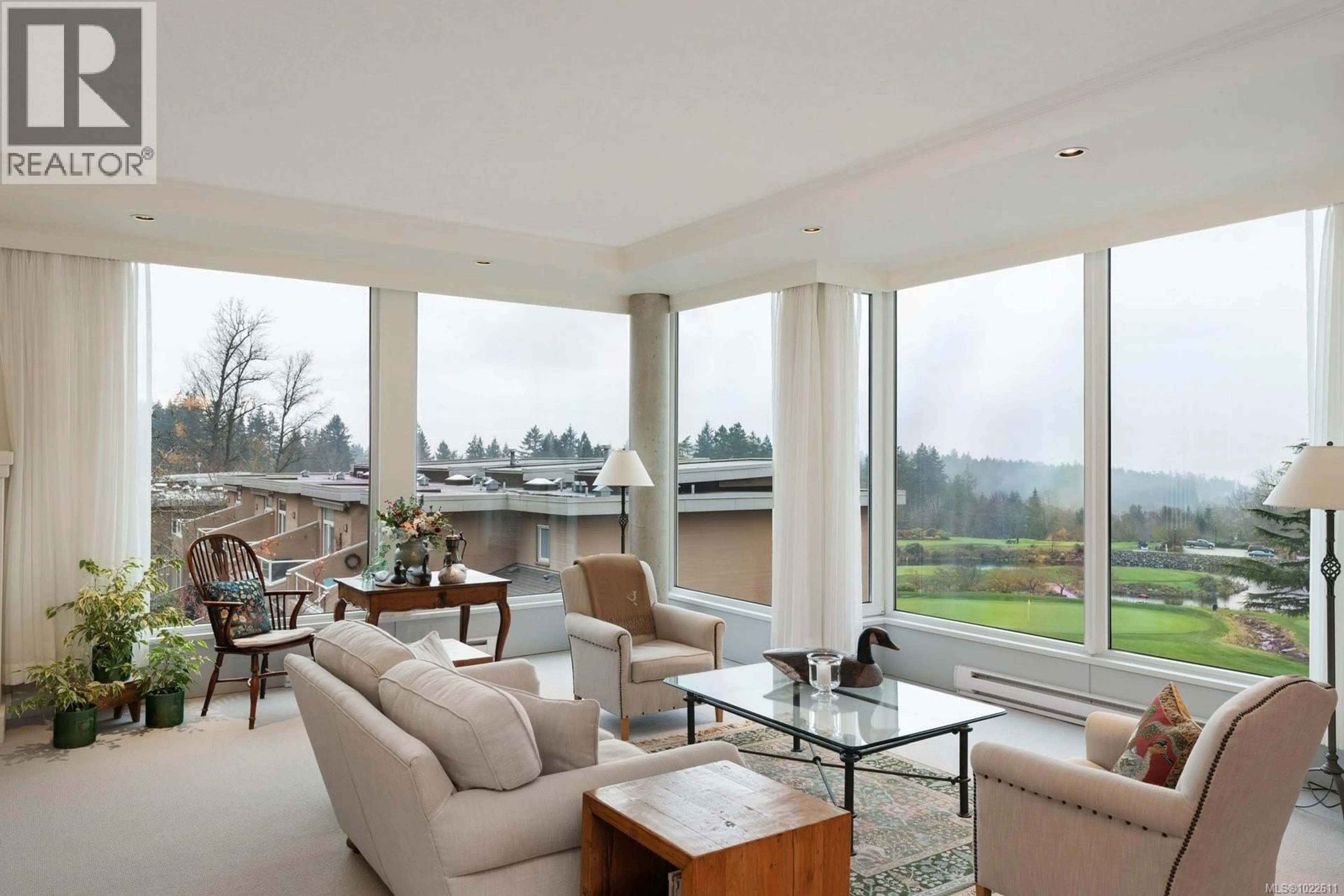 Living room with furniture, unknown for 304 - 5350 SAYWARD HILL CRESCENT, Saanich British Columbia V8Y3H9