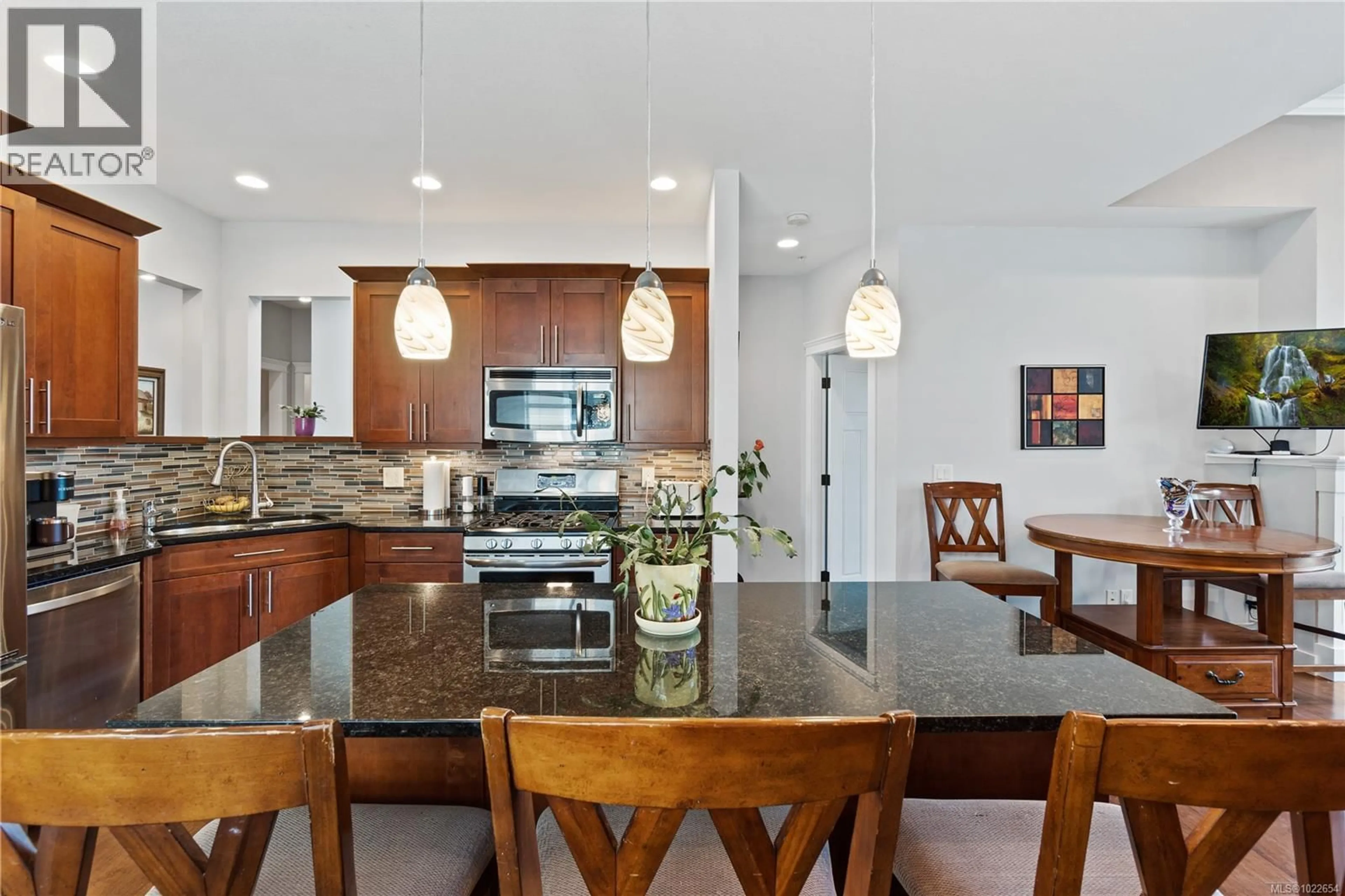 Open concept kitchen, ceramic/tile floor for 6166 ARLIN PLACE, Nanaimo British Columbia V9T0A2