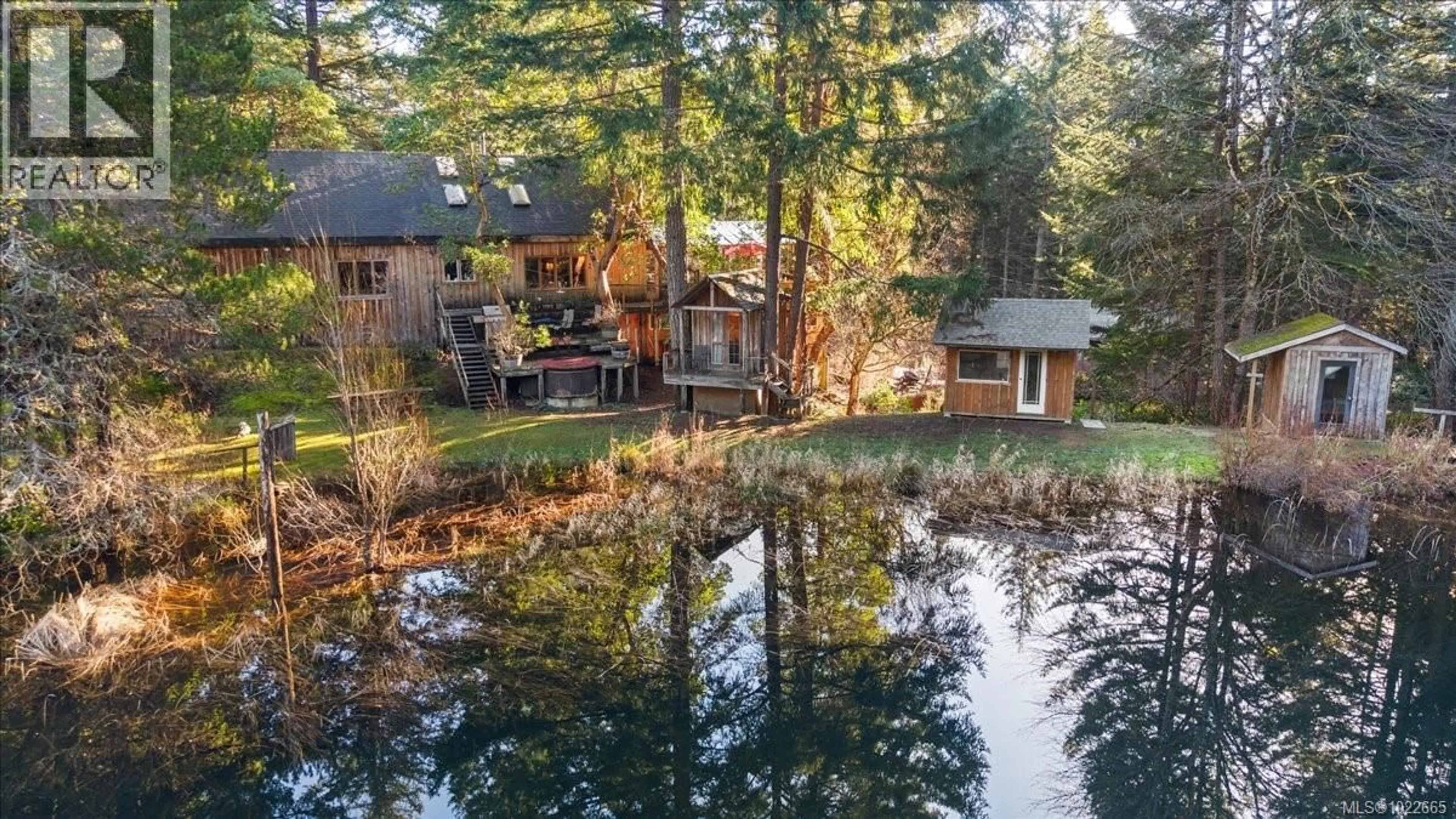 A pic from outside/outdoor area/front of a property/back of a property/a pic from drone, water/lake/river/ocean view for 405 HAZLITT CREEK ROAD, Highlands British Columbia V9E2A3
