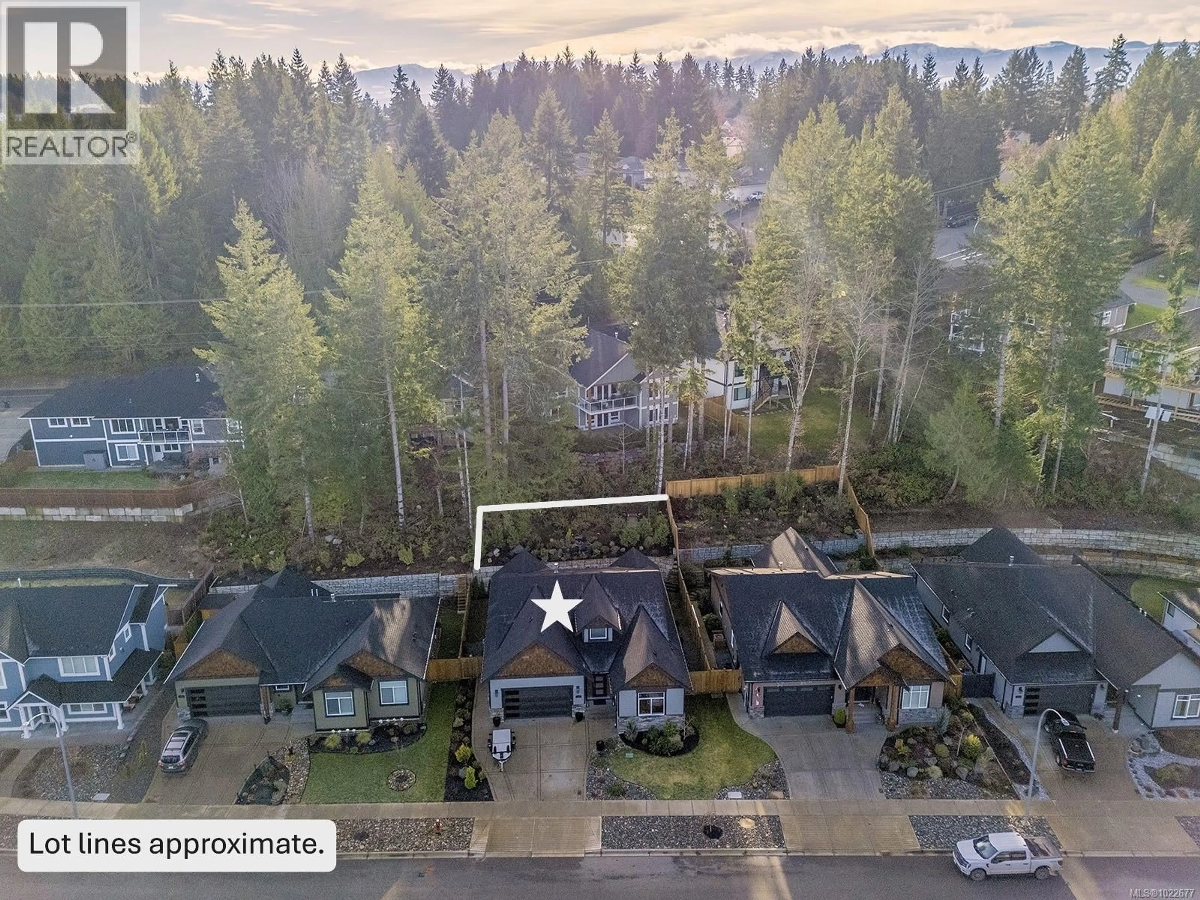 A pic from outside/outdoor area/front of a property/back of a property/a pic from drone, forest/trees view for 3221 KLANAWA CRESCENT, Courtenay British Columbia V9N0H4