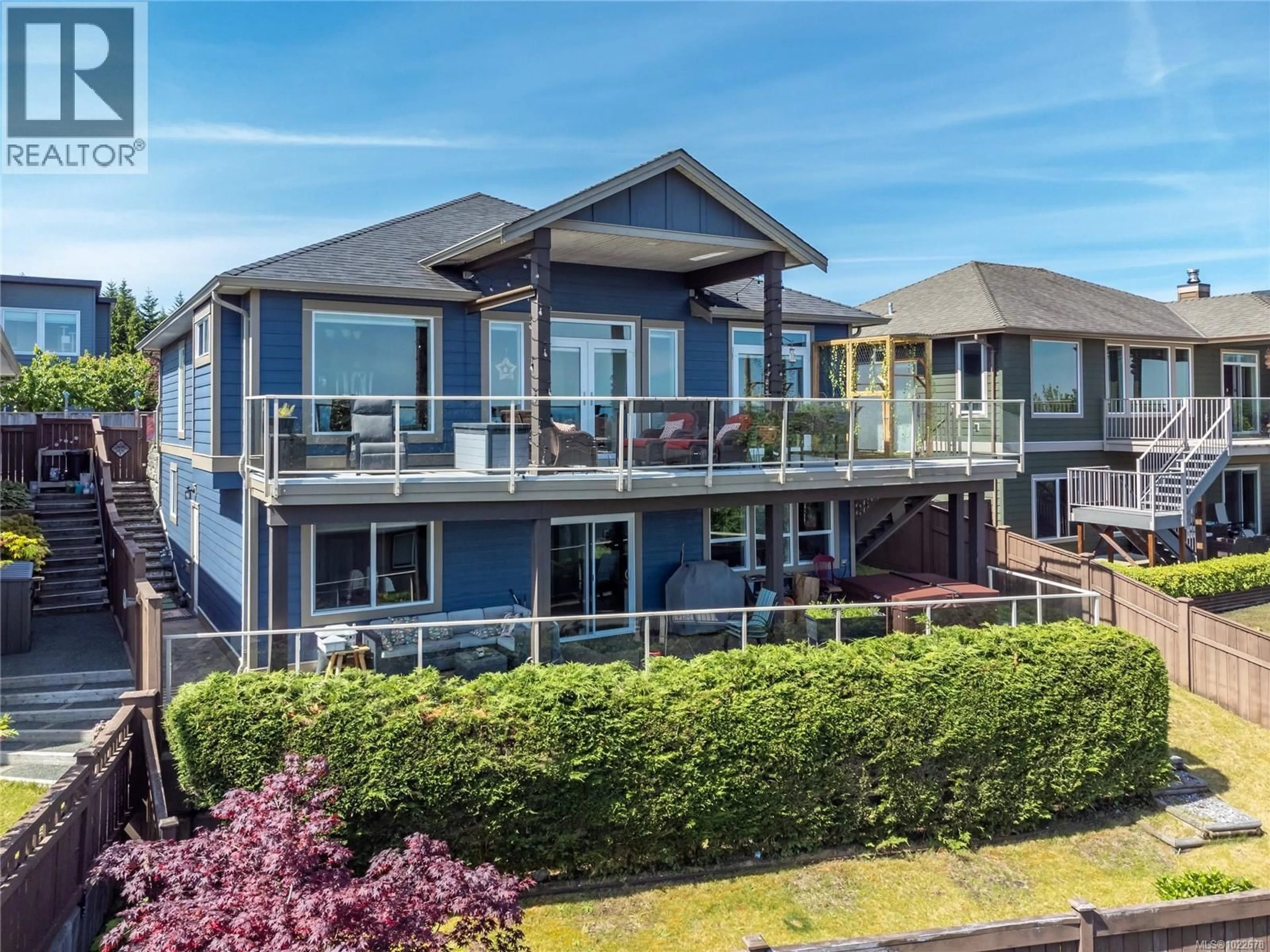 A pic from outside/outdoor area/front of a property/back of a property/a pic from drone, water/lake/river/ocean view for 672 PACIFIC HEIGHTS LANE, Campbell River British Columbia V9H0A6
