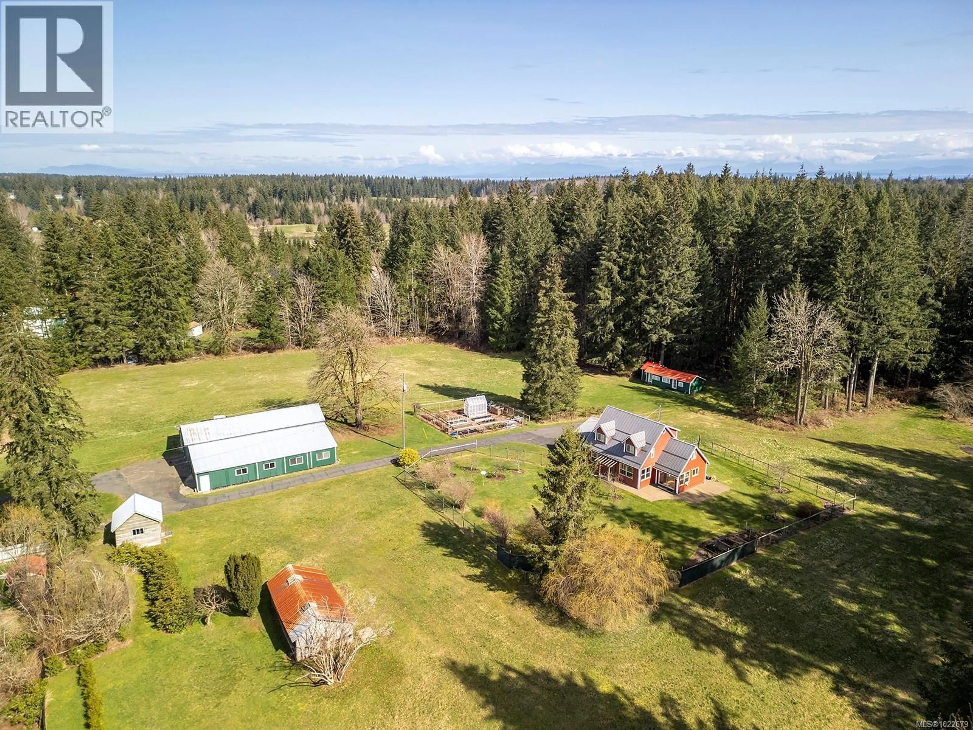 A pic from outside/outdoor area/front of a property/back of a property/a pic from drone, unknown for 7792 ISLAND HIGHWAY NORTH, Black Creek British Columbia V9J1G5