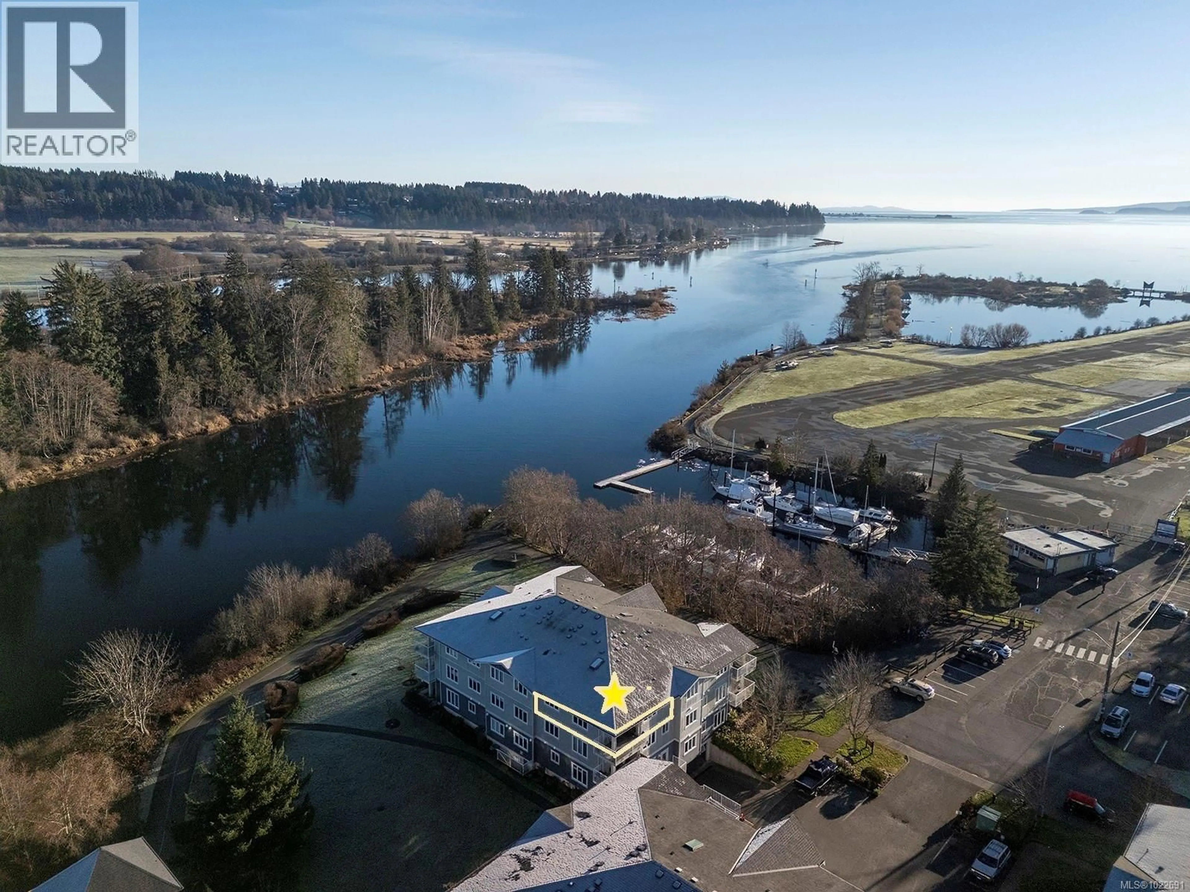 A pic from outside/outdoor area/front of a property/back of a property/a pic from drone, water/lake/river/ocean view for 33 - 111 20TH STREET, Courtenay British Columbia V9N8B1