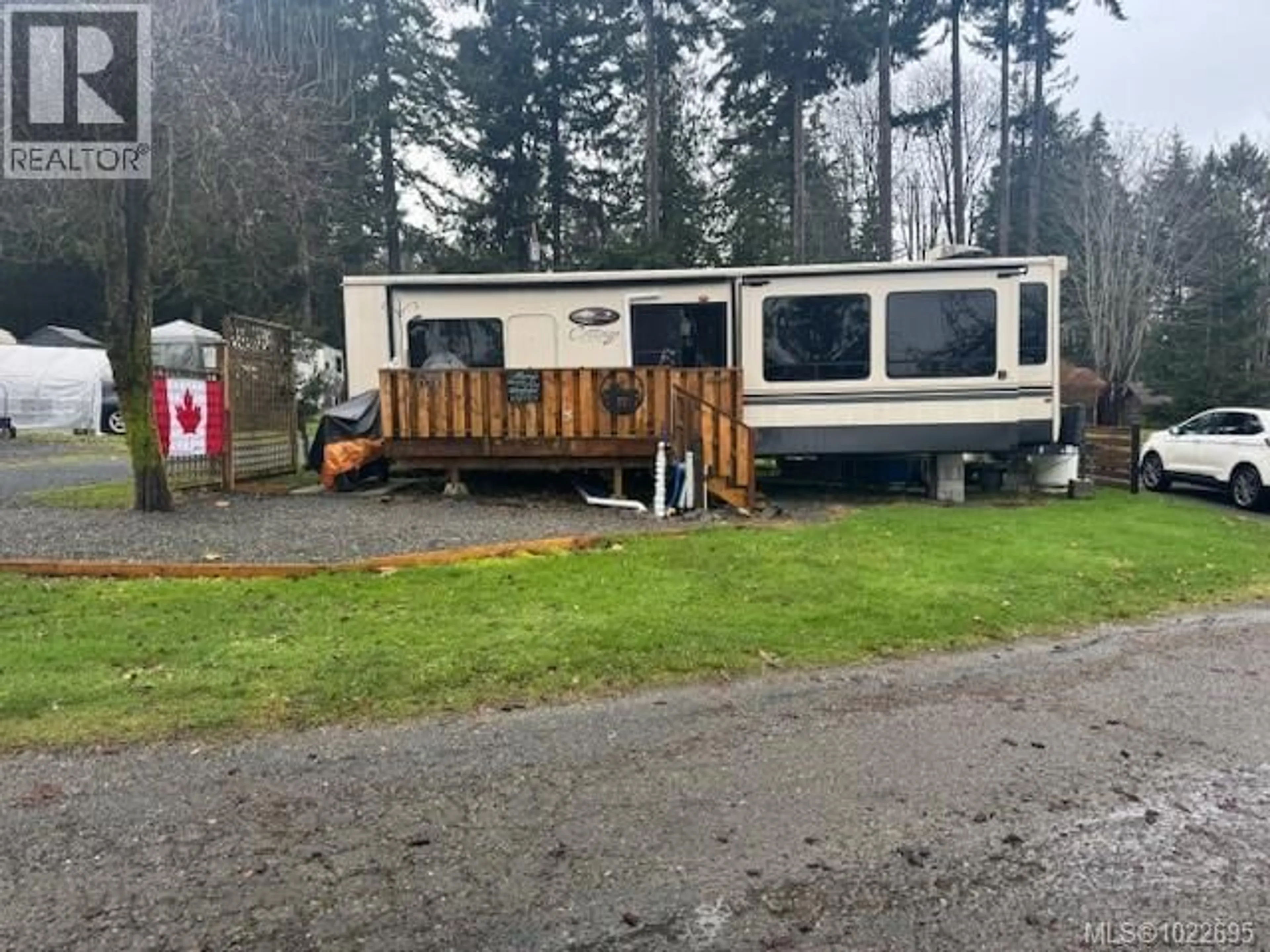 A pic from outside/outdoor area/front of a property/back of a property/a pic from drone, mountain view for 1 - 6901 ISLAND HIGHWAY, Bowser British Columbia V0R1G0