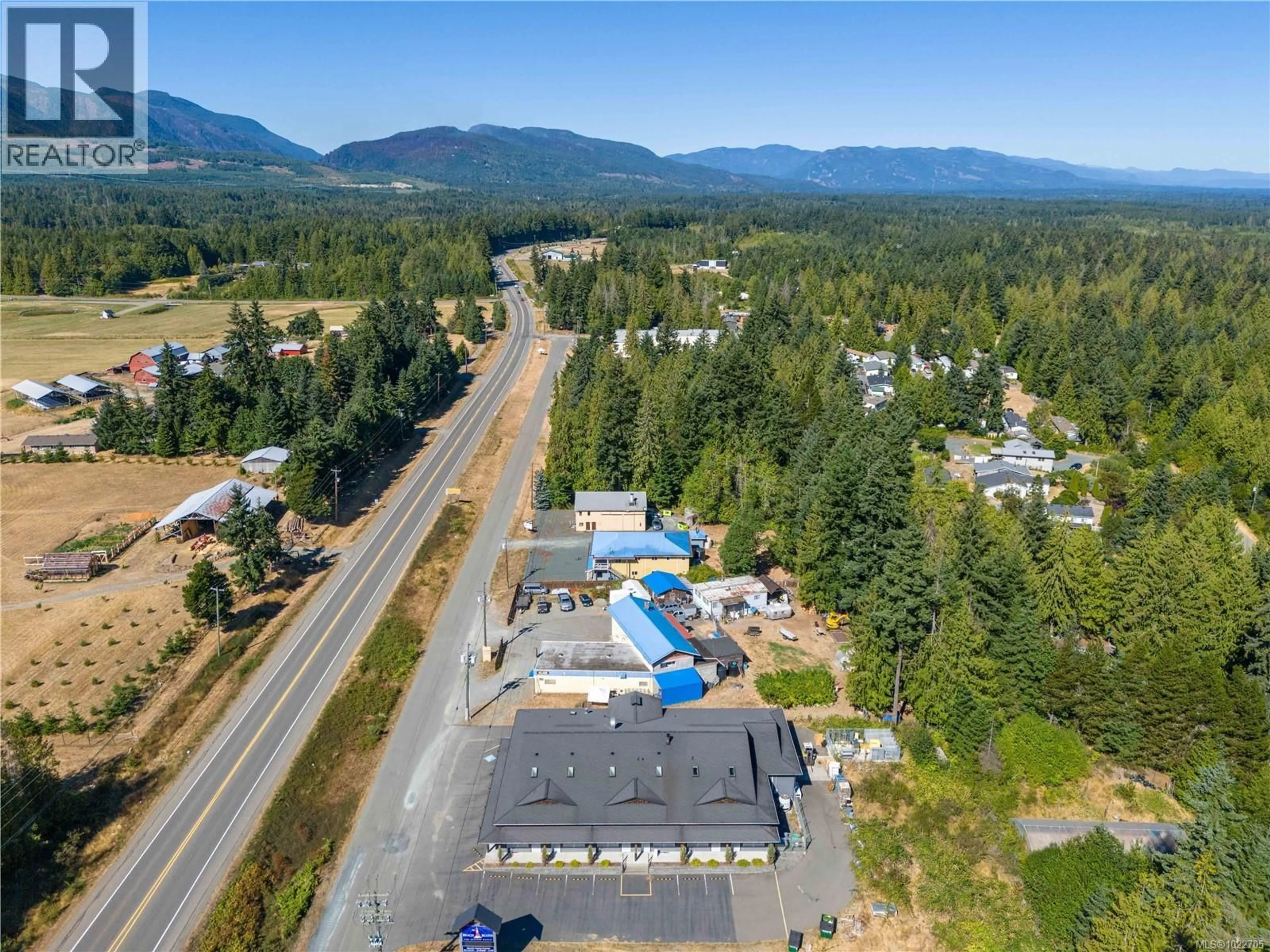 A pic from outside/outdoor area/front of a property/back of a property/a pic from drone, mountain view for 3051 VAN HORNE ROAD, Coombs British Columbia V9K1X2