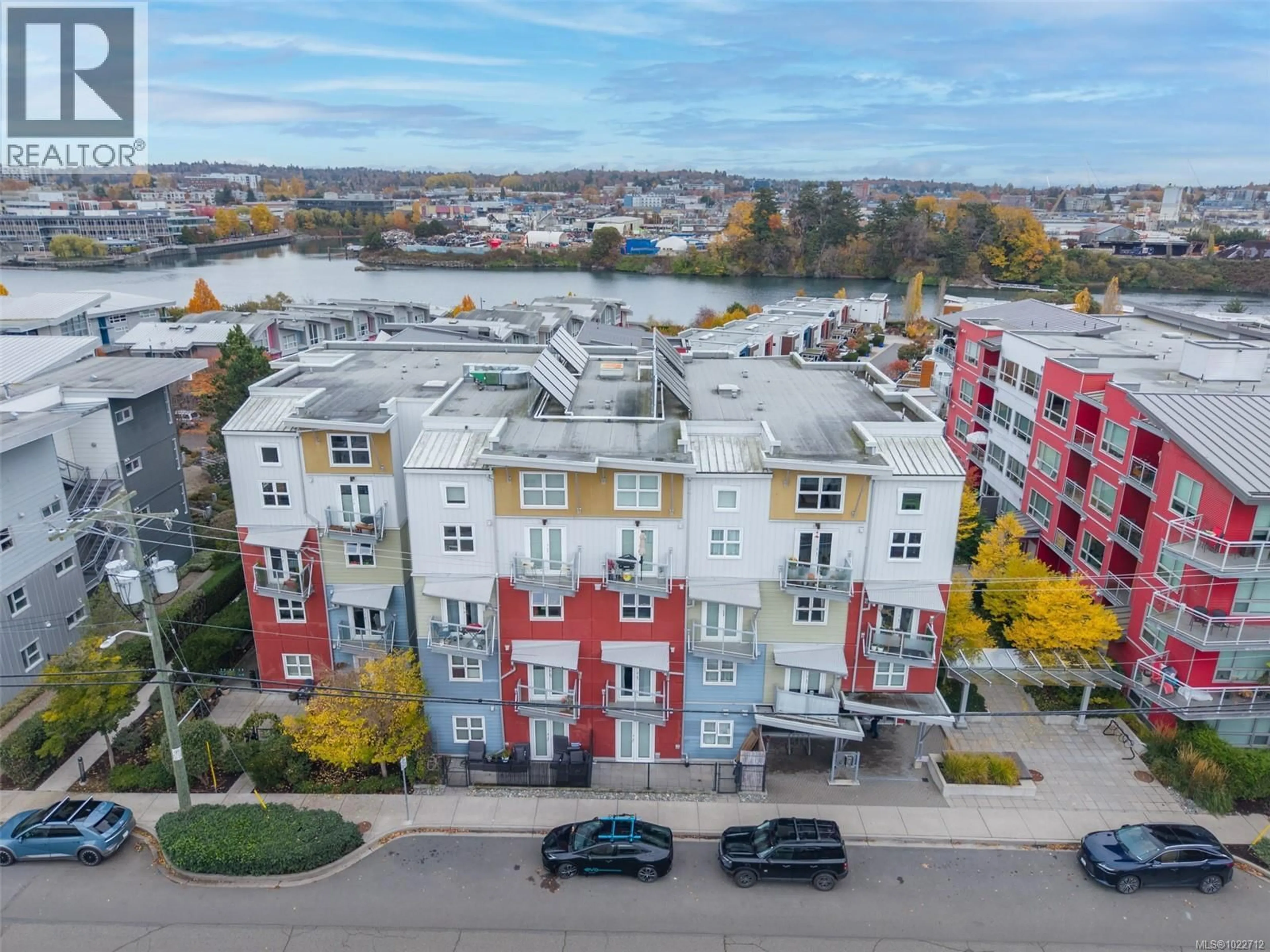 A pic from outside/outdoor area/front of a property/back of a property/a pic from drone, city buildings view from balcony for 405 - 787 TYEE ROAD, Victoria British Columbia V9A7R5