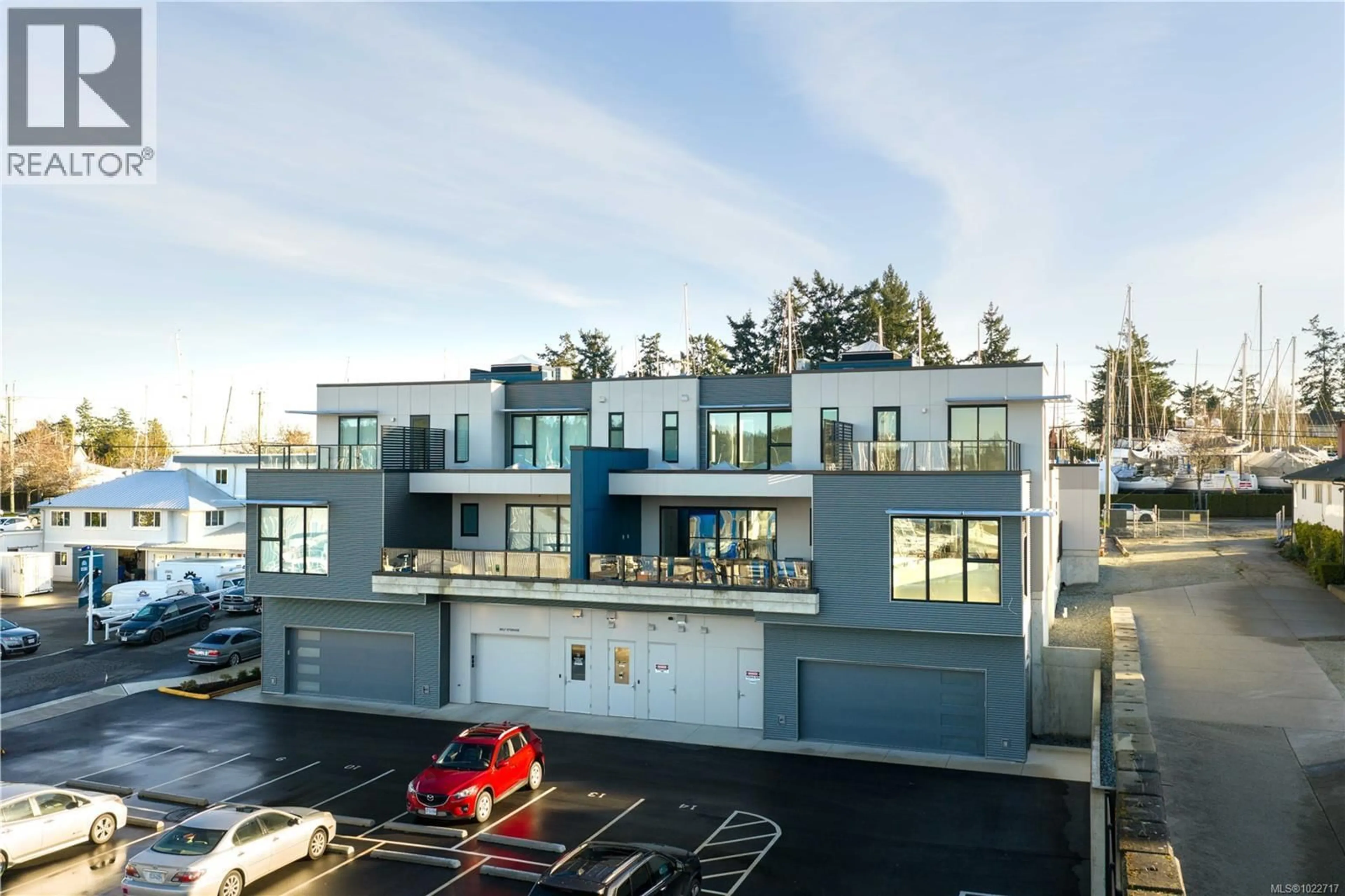A pic from outside/outdoor area/front of a property/back of a property/a pic from drone, building for 201 - 2270 HARBOUR ROAD, Sidney British Columbia V8L2P6