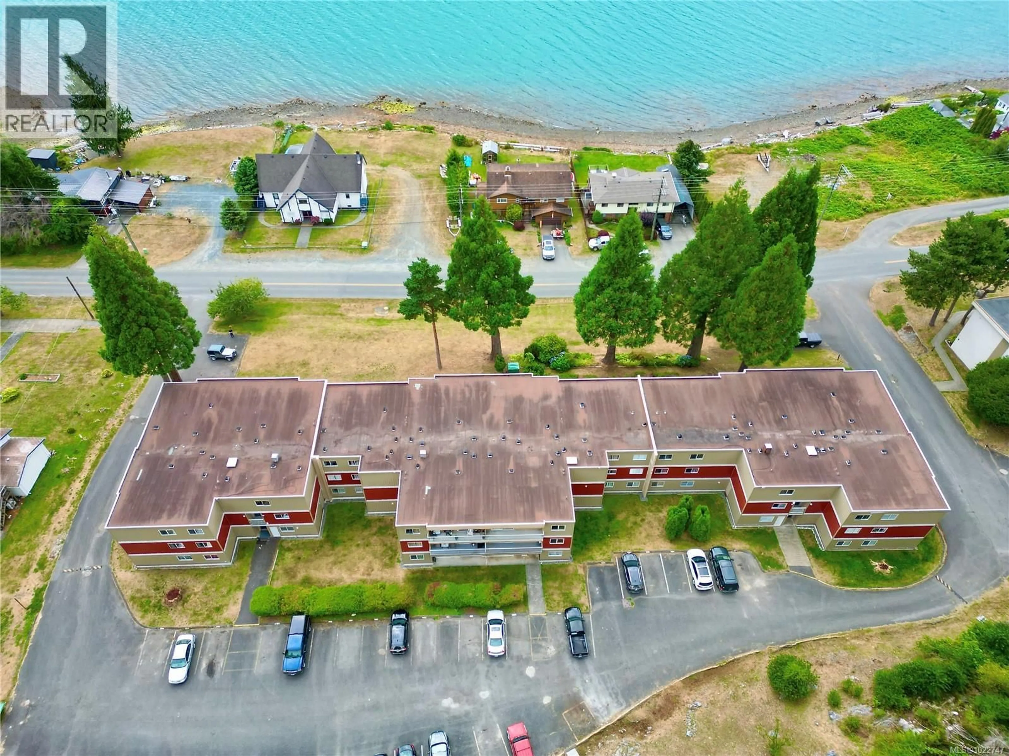 A pic from outside/outdoor area/front of a property/back of a property/a pic from drone, water/lake/river/ocean view for 302 - 801 MARINE DRIVE, Port Alice British Columbia V0N2N0