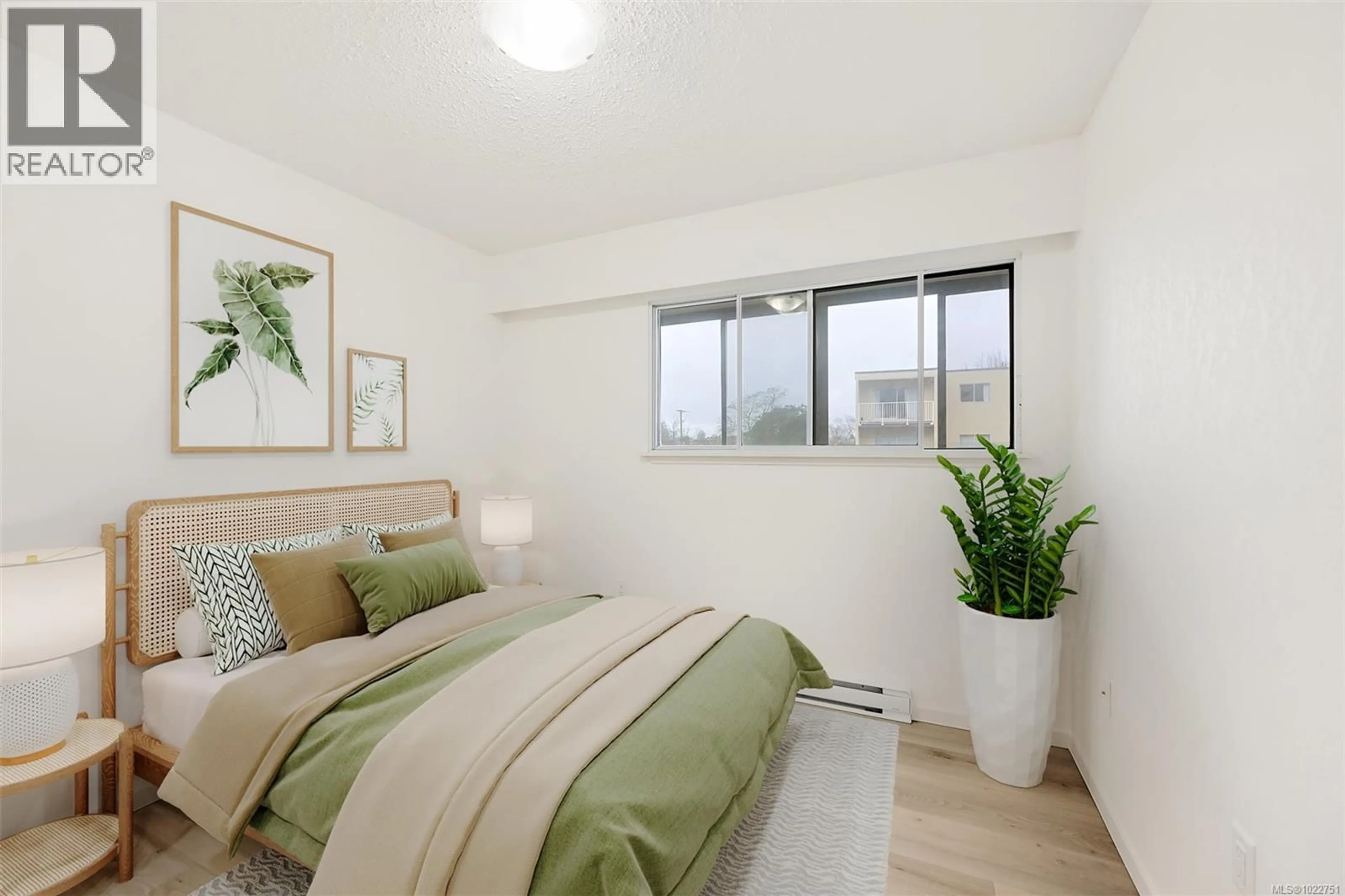 Bedroom with bed, unknown for 206 - 2610 GRAHAM STREET, Victoria British Columbia V8T3Y9