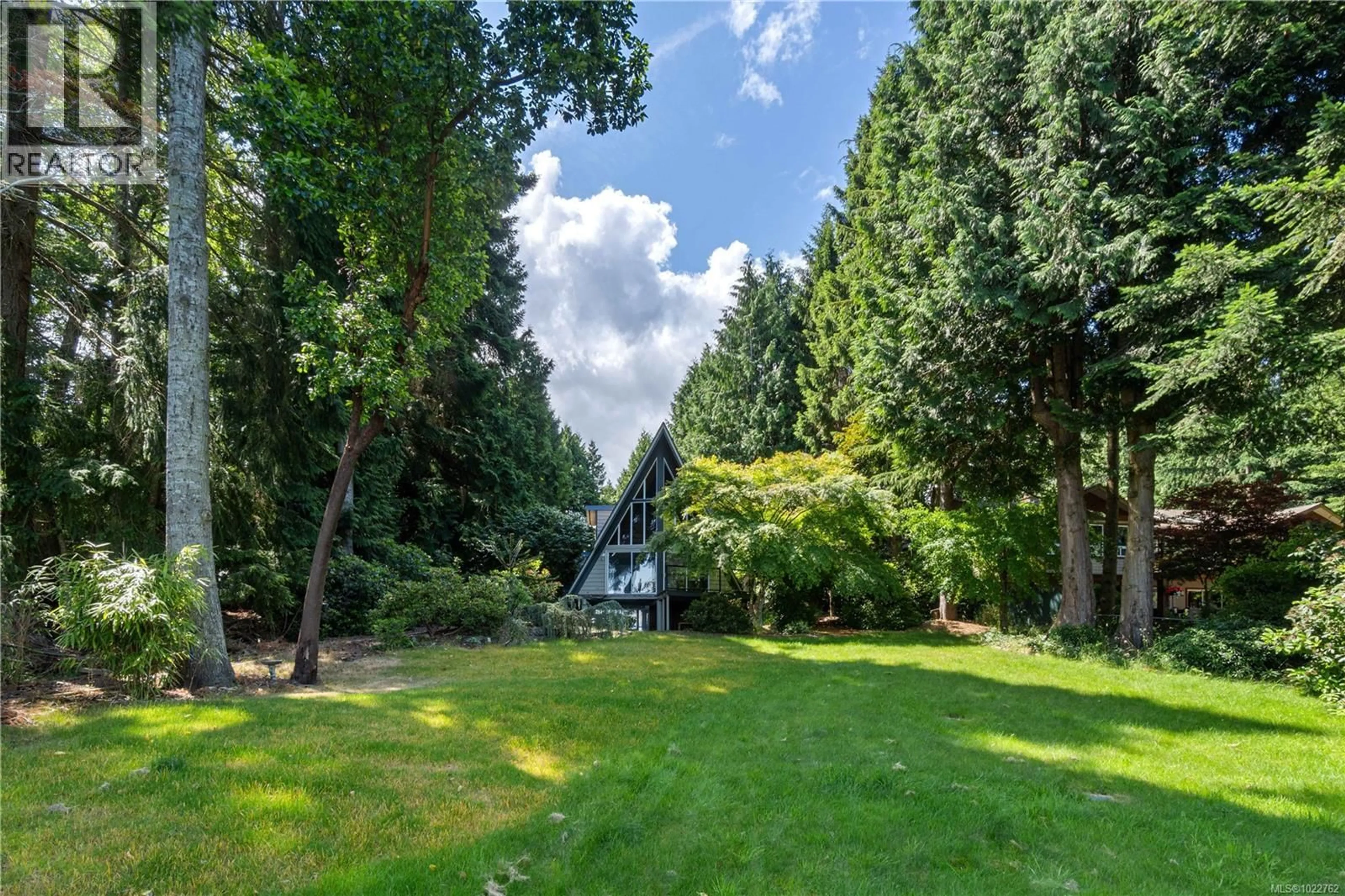 A pic from outside/outdoor area/front of a property/back of a property/a pic from drone, forest/trees view for 5948 WALDBANK ROAD, Nanaimo British Columbia V9V1C8