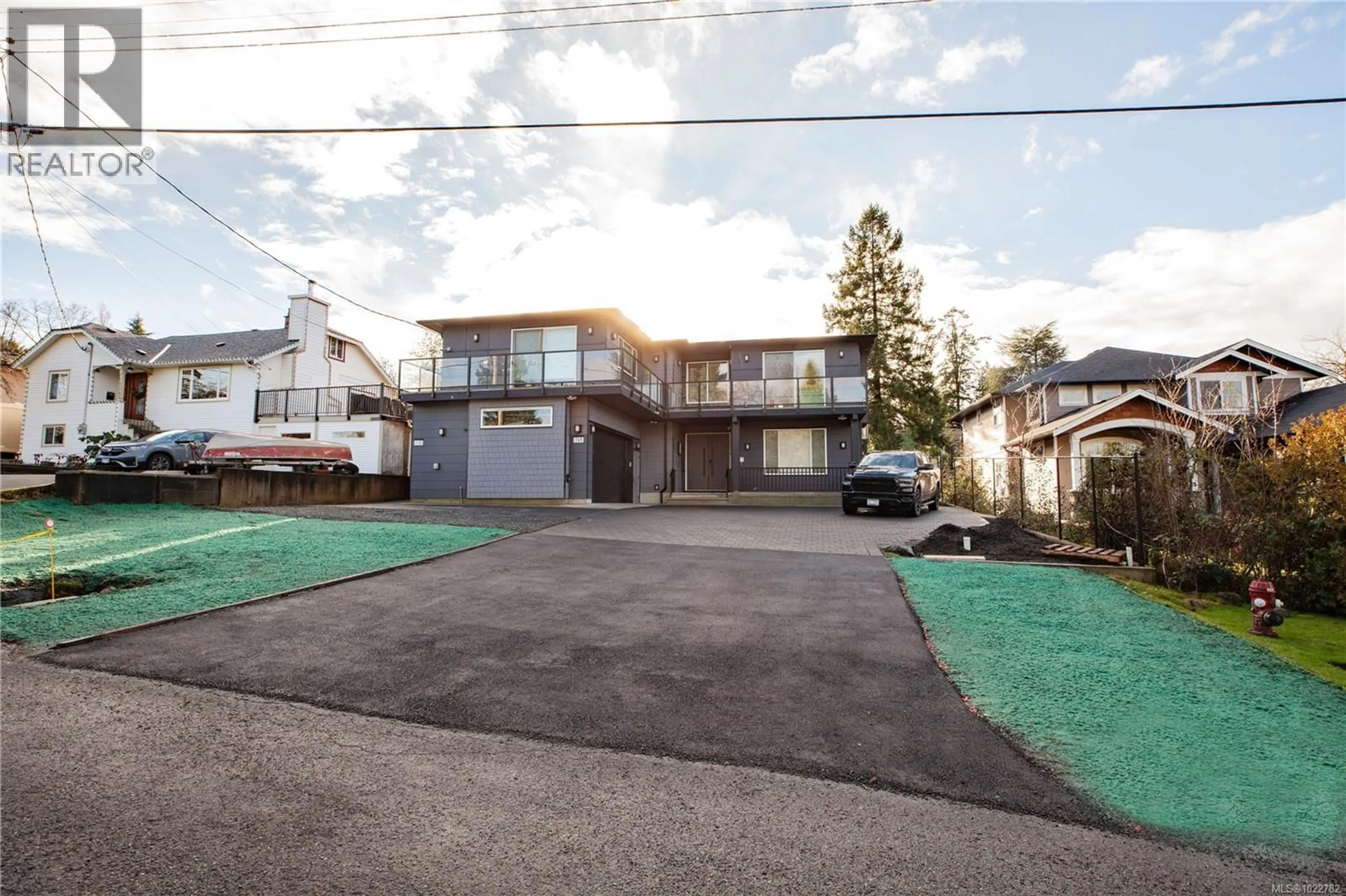 A pic from outside/outdoor area/front of a property/back of a property/a pic from drone, street for 741 SNOWDROP AVENUE, Saanich British Columbia V8Z2N3