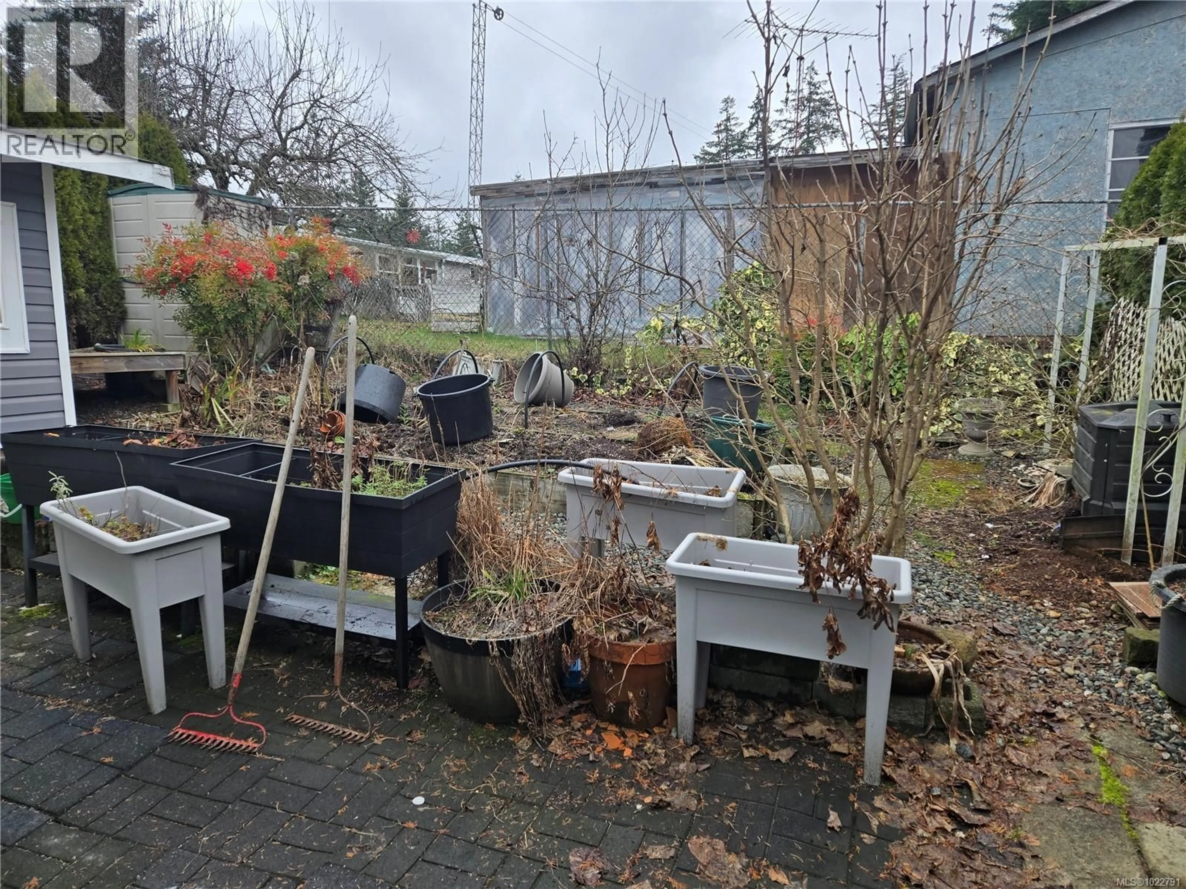 A pic from outside/outdoor area/front of a property/back of a property/a pic from drone, street for 19 - 2501 LABIEUX ROAD, Nanaimo British Columbia V9T5X3