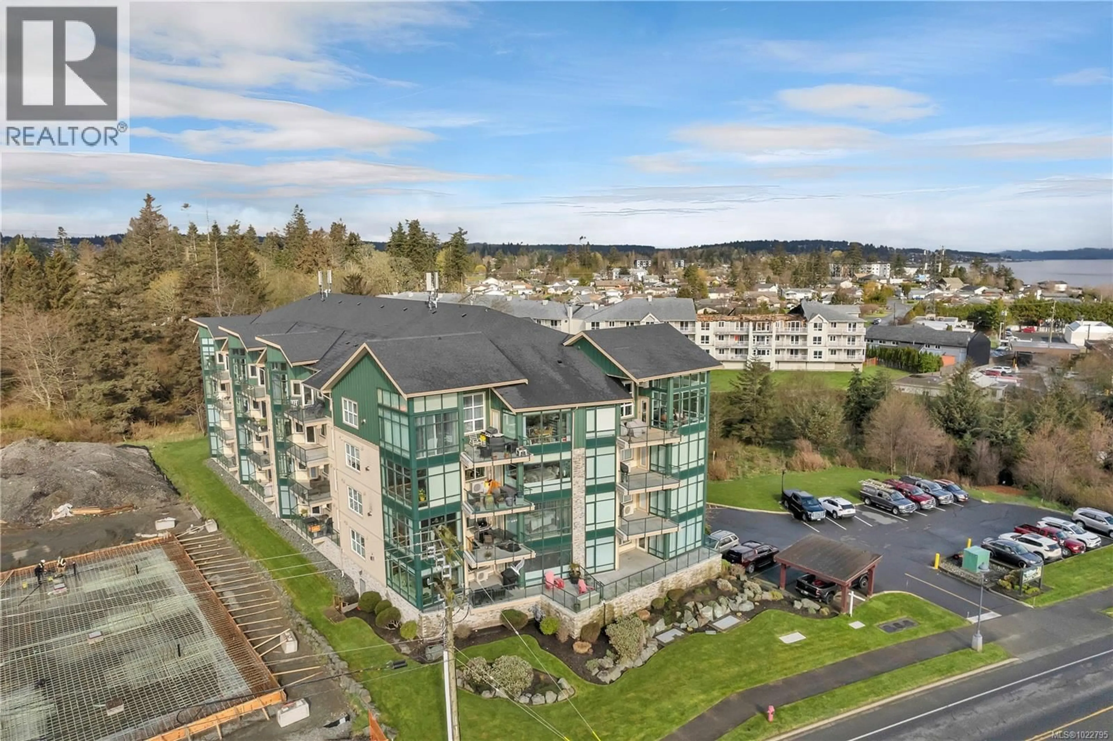 A pic from outside/outdoor area/front of a property/back of a property/a pic from drone, unknown for 401 - 2676 ISLAND HIGHWAY SOUTH, Campbell River British Columbia V9W1C7