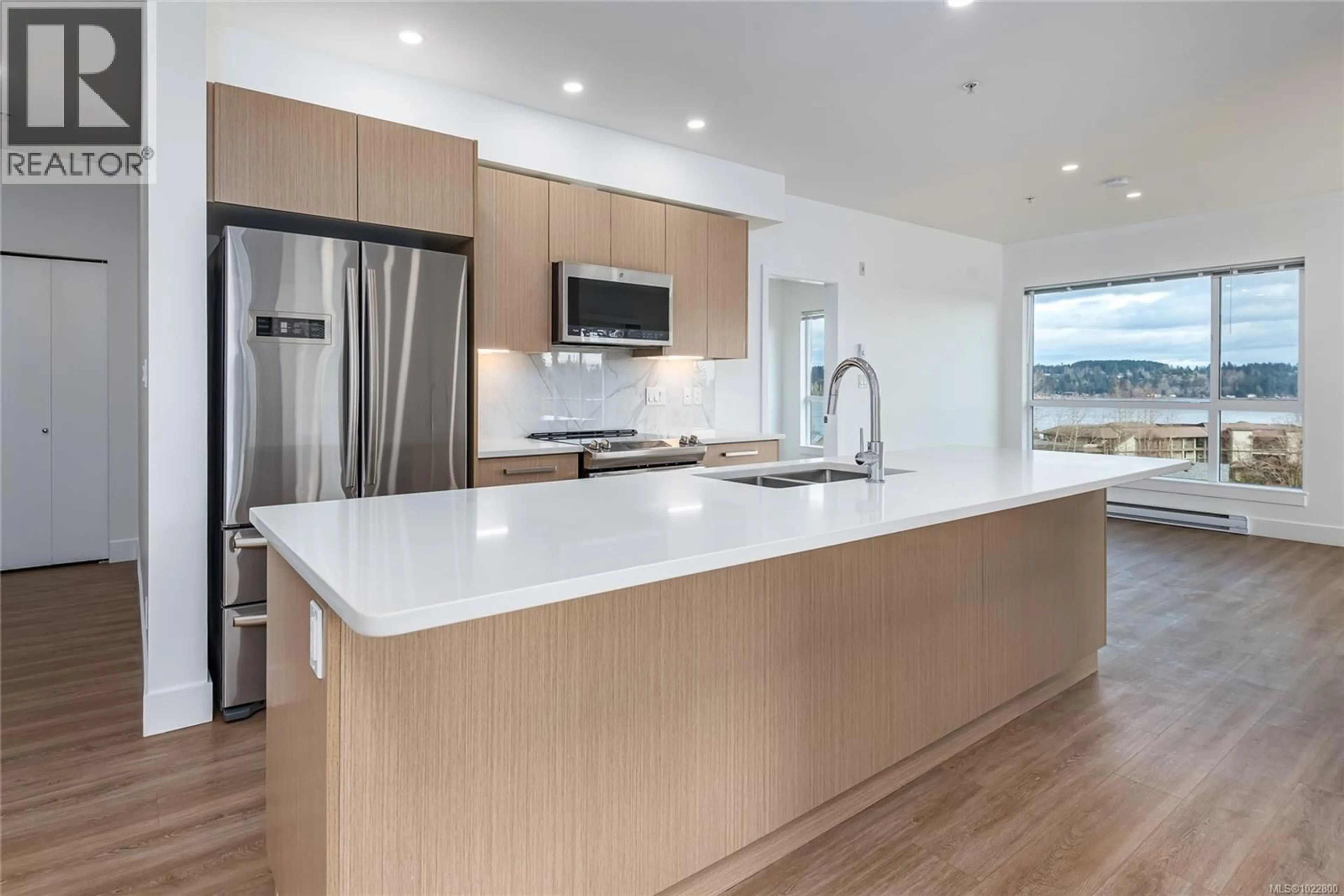 Open concept kitchen, unknown for 207 - 3070 KILPATRICK AVENUE, Courtenay British Columbia V9N0G7