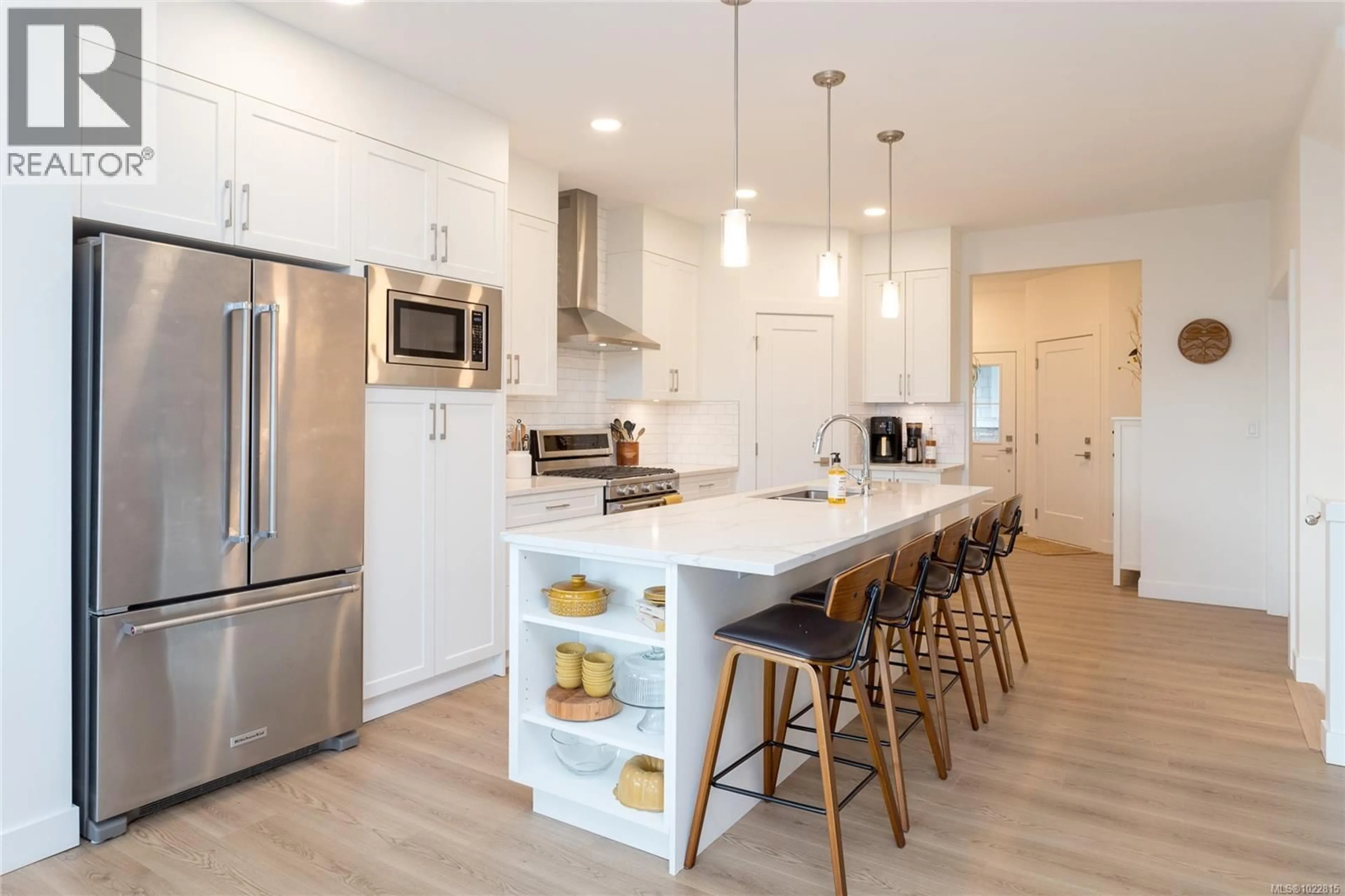 Open concept kitchen, wood/laminate floor for 3453 SANDPIPER STREET, Colwood British Columbia V9C0R5