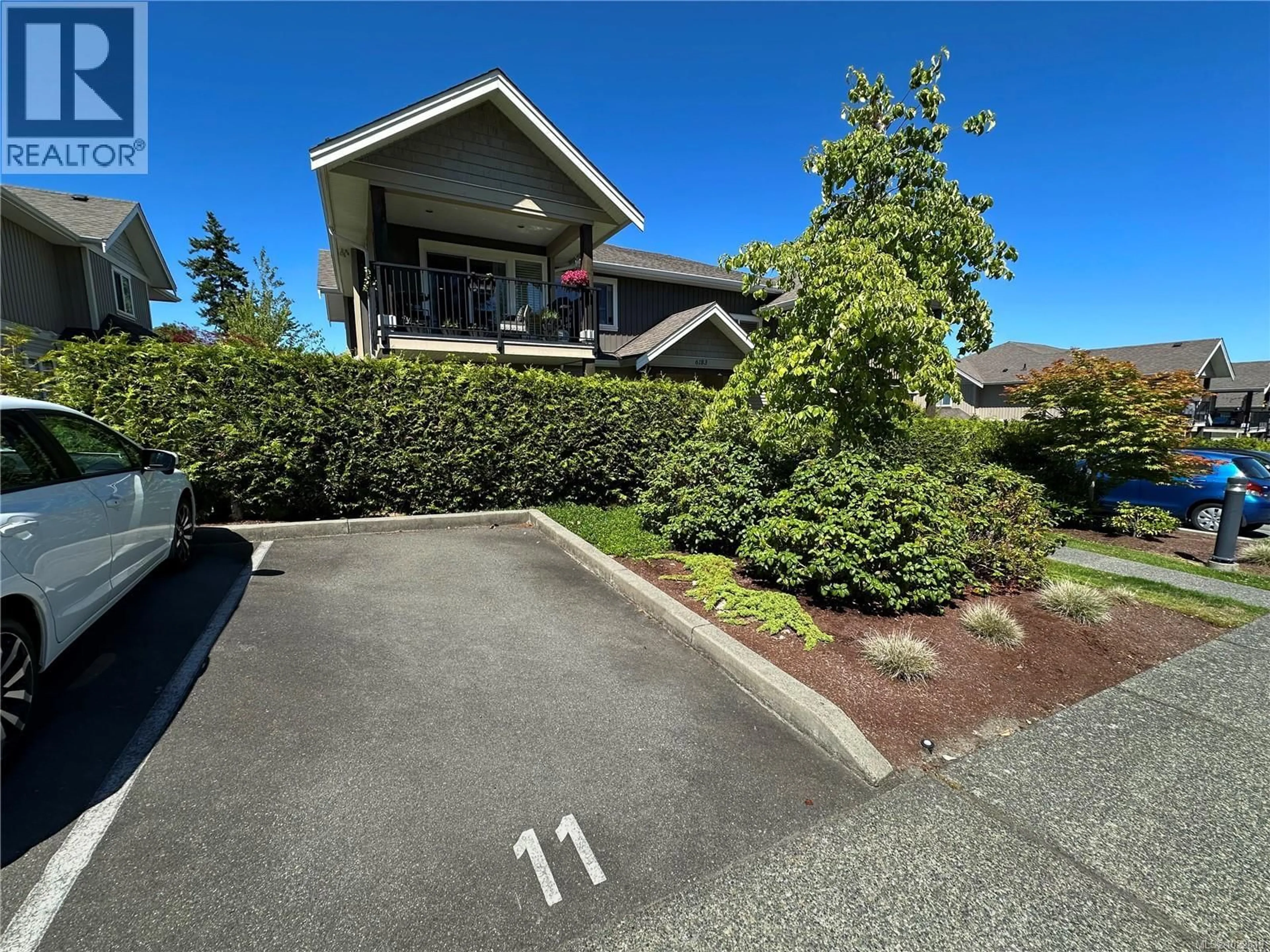 A pic from outside/outdoor area/front of a property/back of a property/a pic from drone, street for 3 - 6183 NITINAT WAY, Nanaimo British Columbia V9V0A9