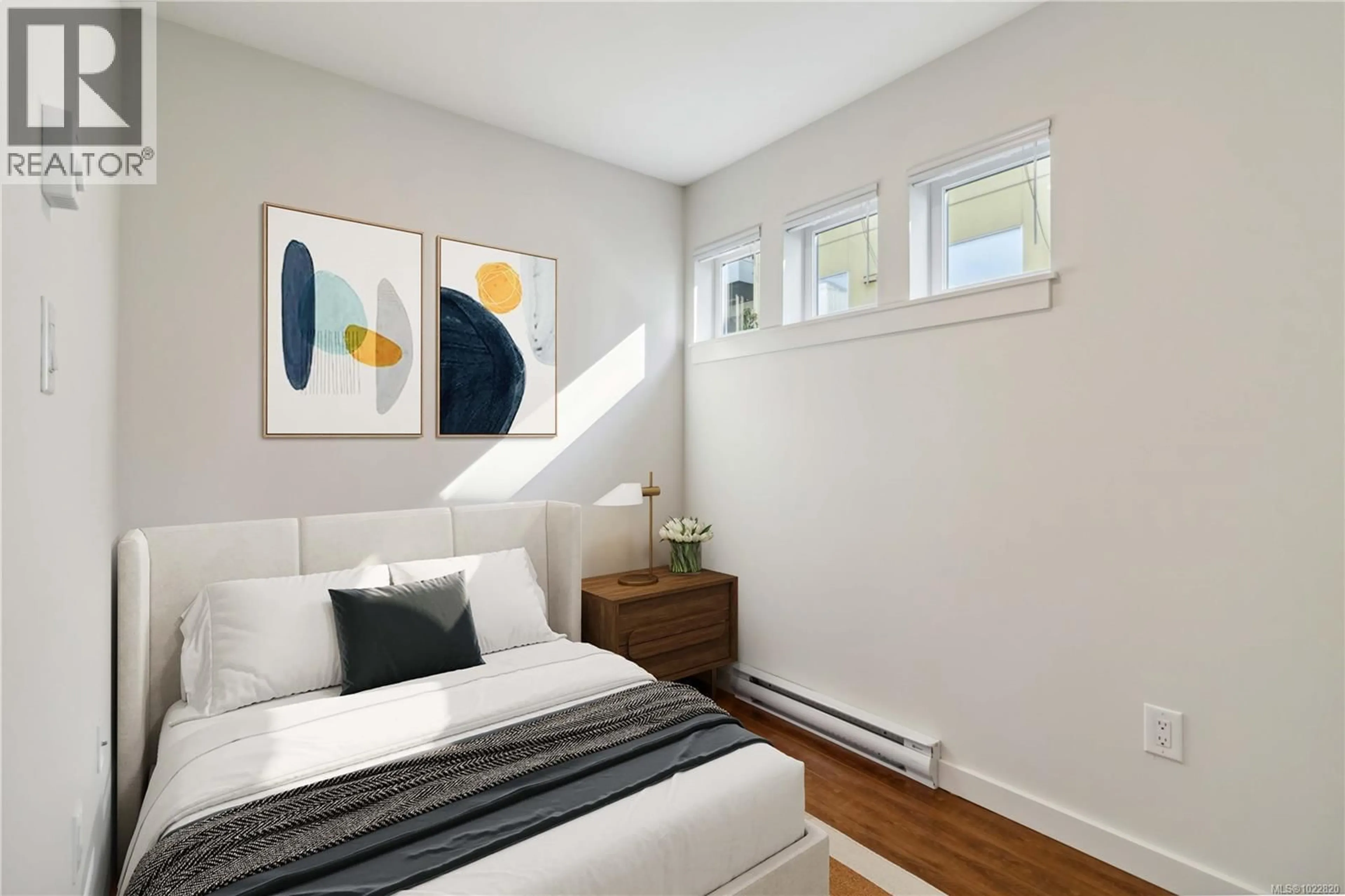 Bedroom with bed, wood/laminate floor for 308 - 1405 ESQUIMALT ROAD, Esquimalt British Columbia V9A0A4