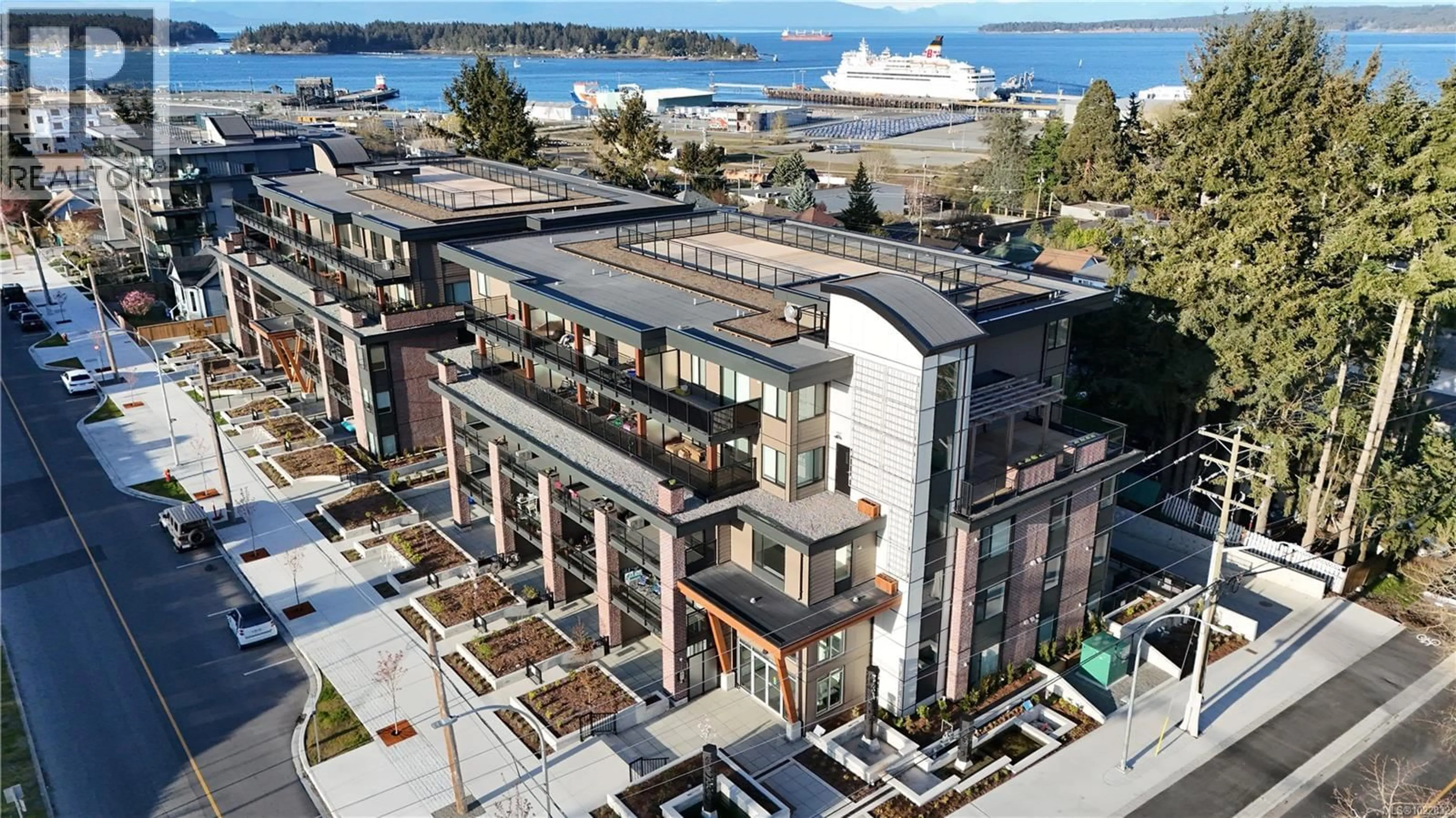 A pic from outside/outdoor area/front of a property/back of a property/a pic from drone, unknown for 102 - 147 HALIBURTON STREET, Nanaimo British Columbia V9R4V9