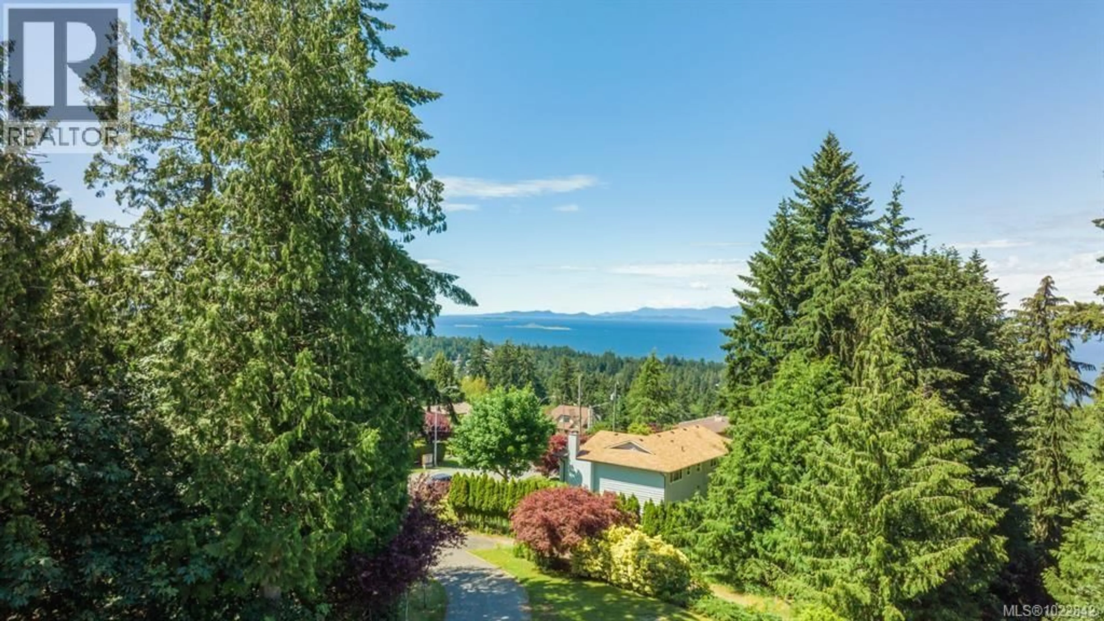 A pic from outside/outdoor area/front of a property/back of a property/a pic from drone, water/lake/river/ocean view for 5650 ALDER WAY, Nanaimo British Columbia V9T5N4