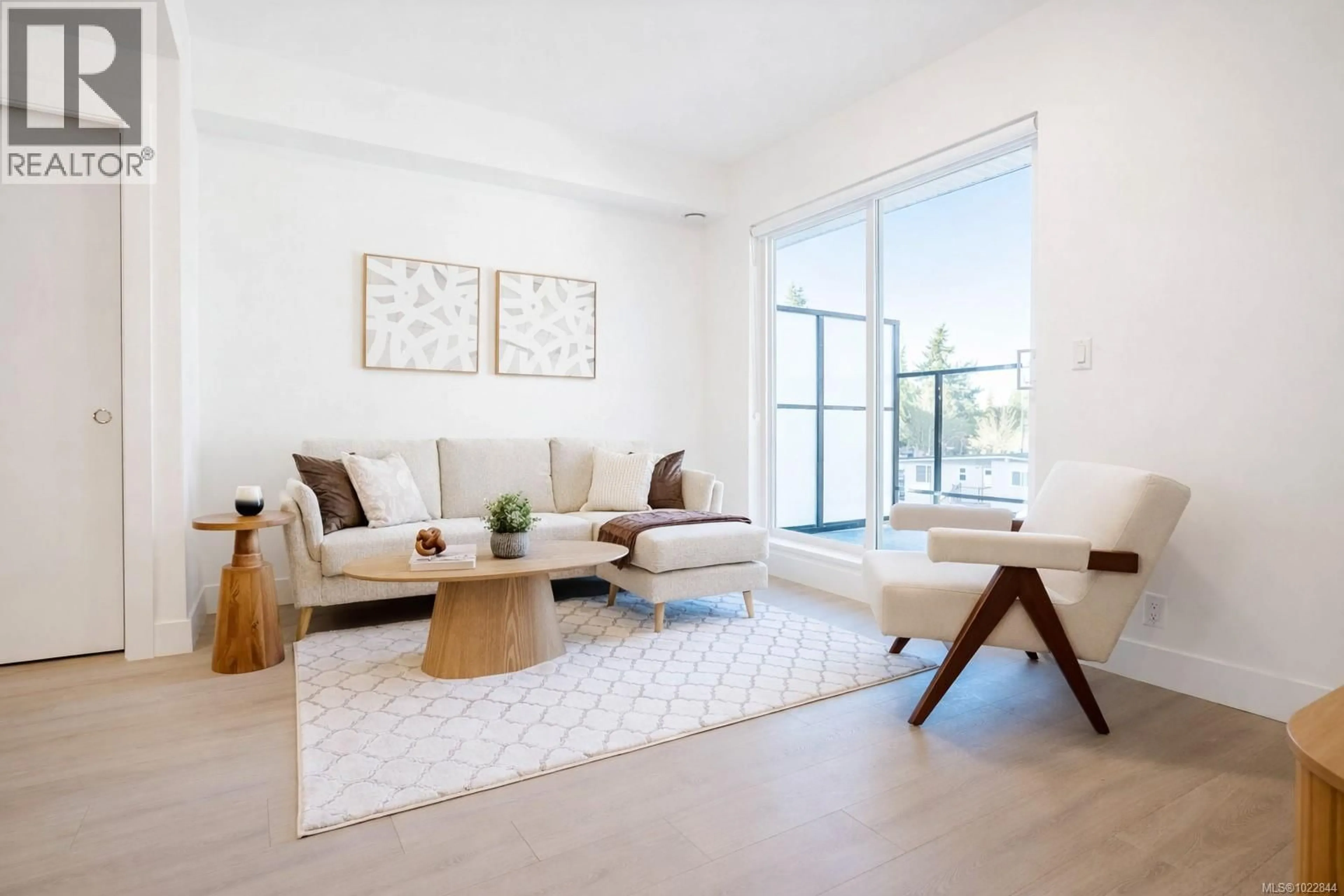 Living room with furniture, unknown for 304 - 258 HELMCKEN ROAD, View Royal British Columbia V9B7G9