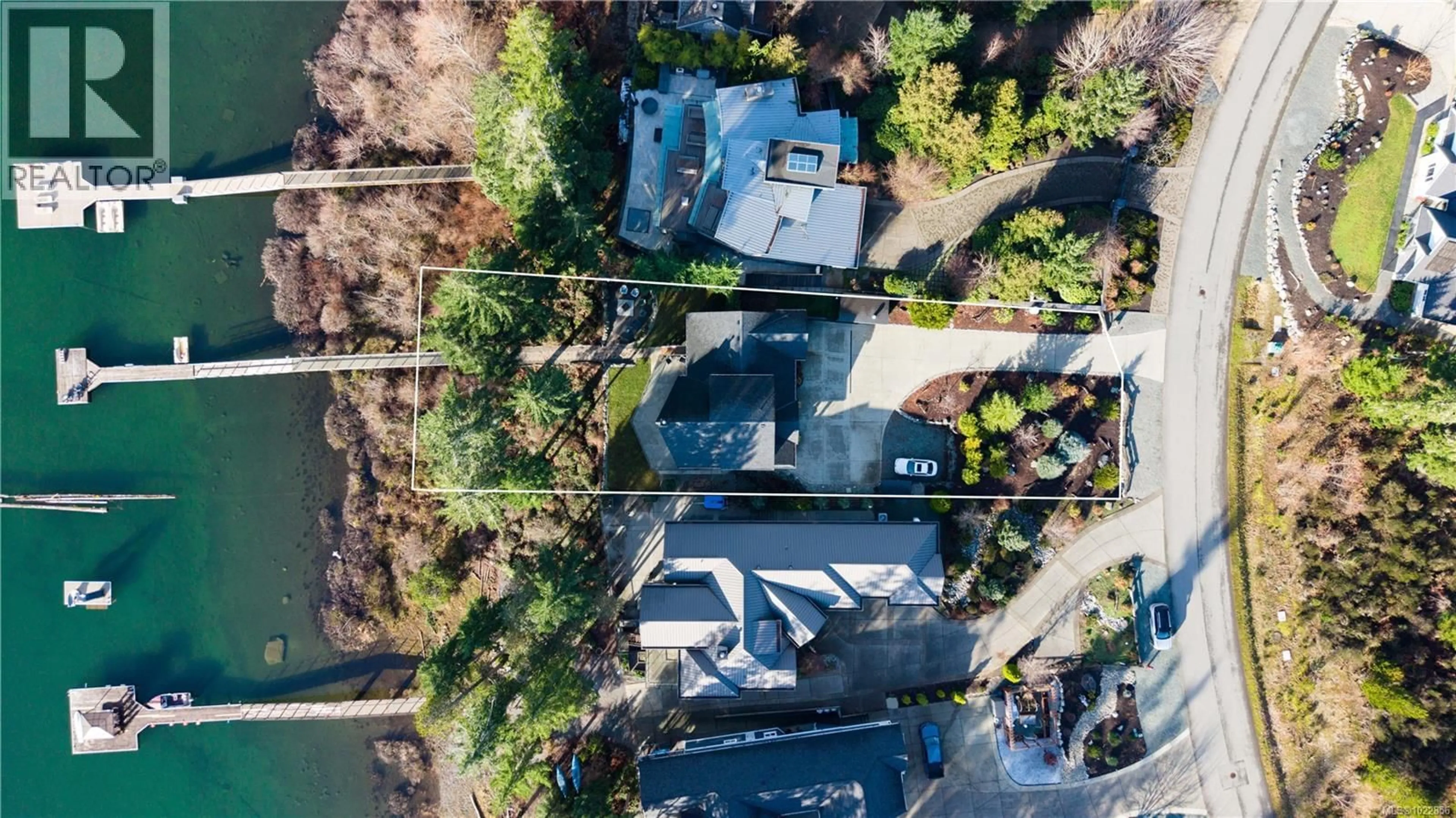 A pic from outside/outdoor area/front of a property/back of a property/a pic from drone, water/lake/river/ocean view for 7364 LAKEFRONT DRIVE, Lake Cowichan British Columbia V0R2G0