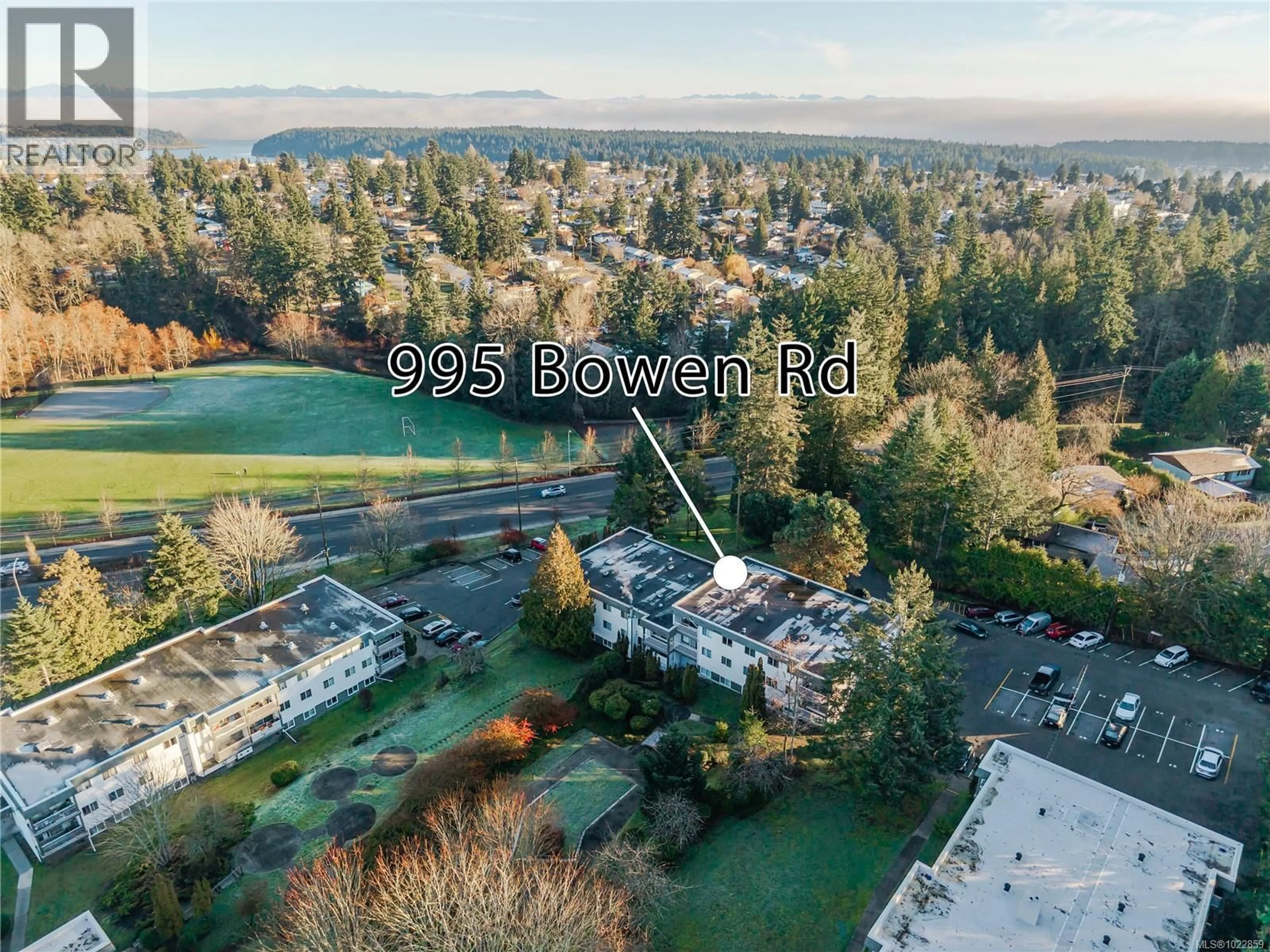 A pic from outside/outdoor area/front of a property/back of a property/a pic from drone, mountain view for 3208 - 995 BOWEN ROAD, Nanaimo British Columbia V9R2A4