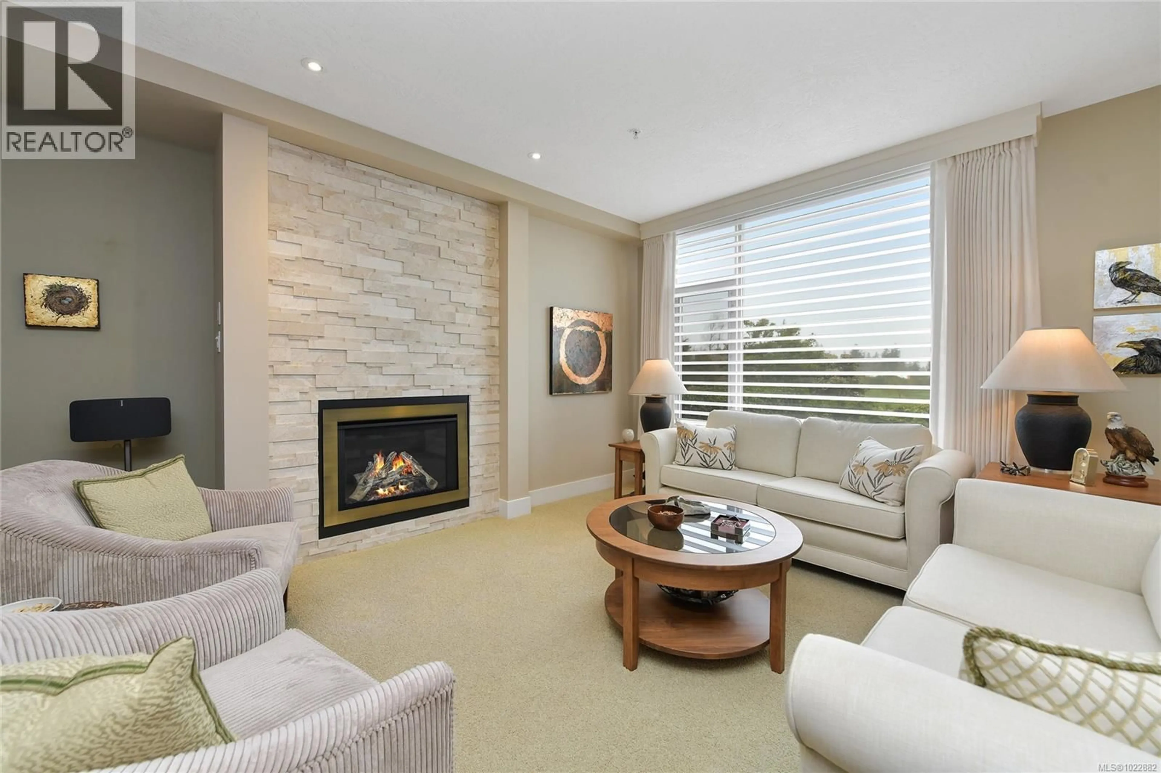 Living room with furniture, ceramic/tile floor for 5336 SAYWARD HILL CRESCENT, Saanich British Columbia V8Y3H8