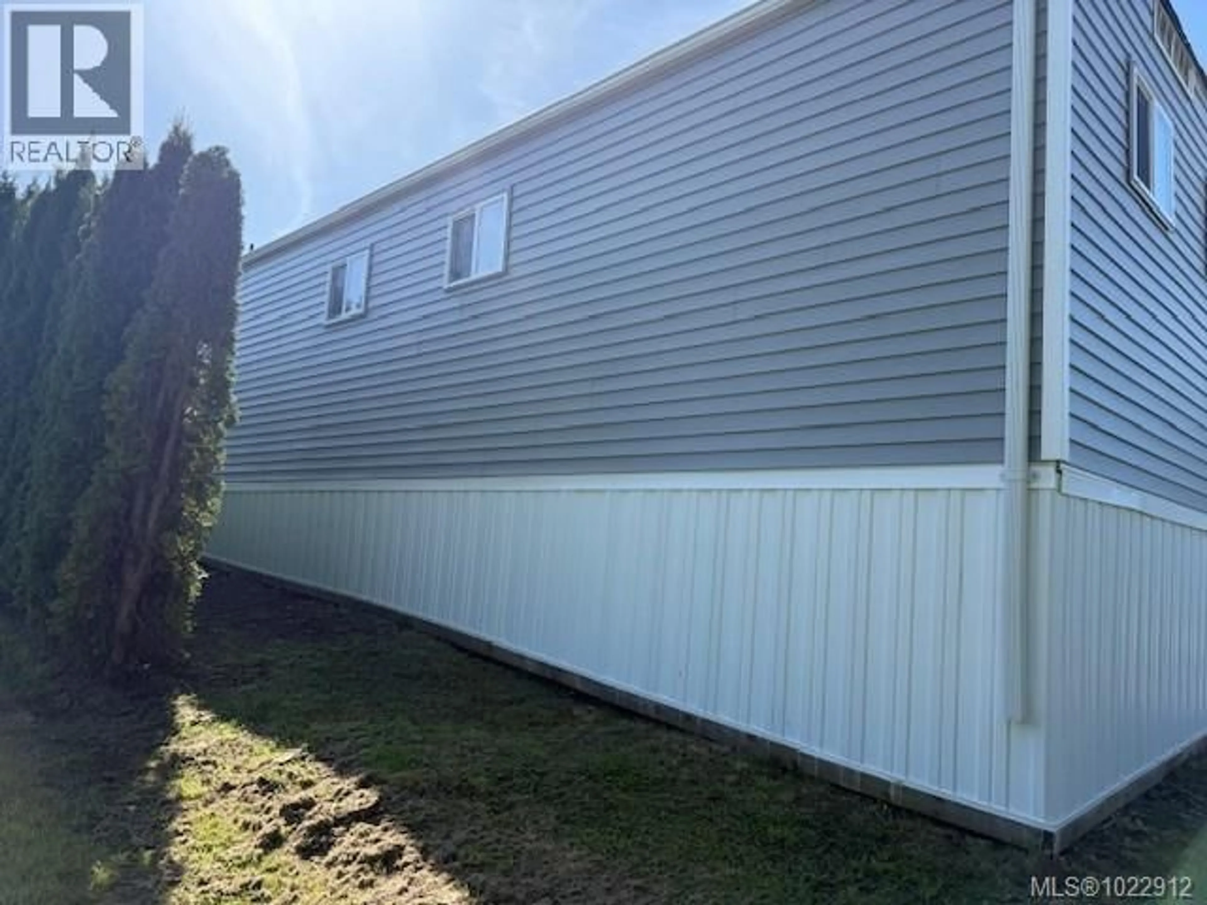 Home with vinyl exterior material, building for 74 - 5250 BEAVER HARBOUR ROAD, Port Hardy British Columbia V0N2P0
