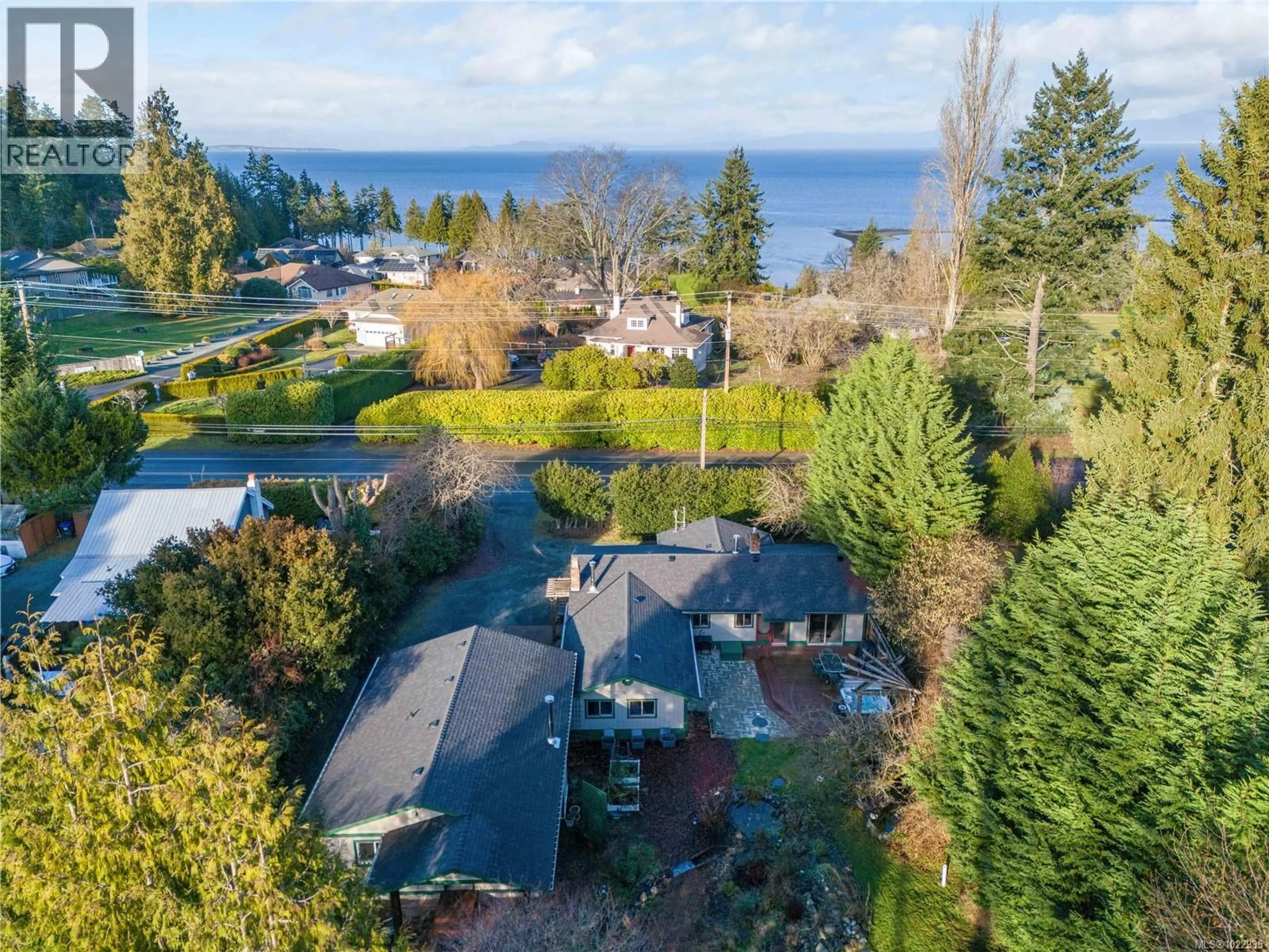A pic from outside/outdoor area/front of a property/back of a property/a pic from drone, water/lake/river/ocean view for 3872 ISLAND HIGHWAY WEST, Qualicum Beach British Columbia V9K2G9