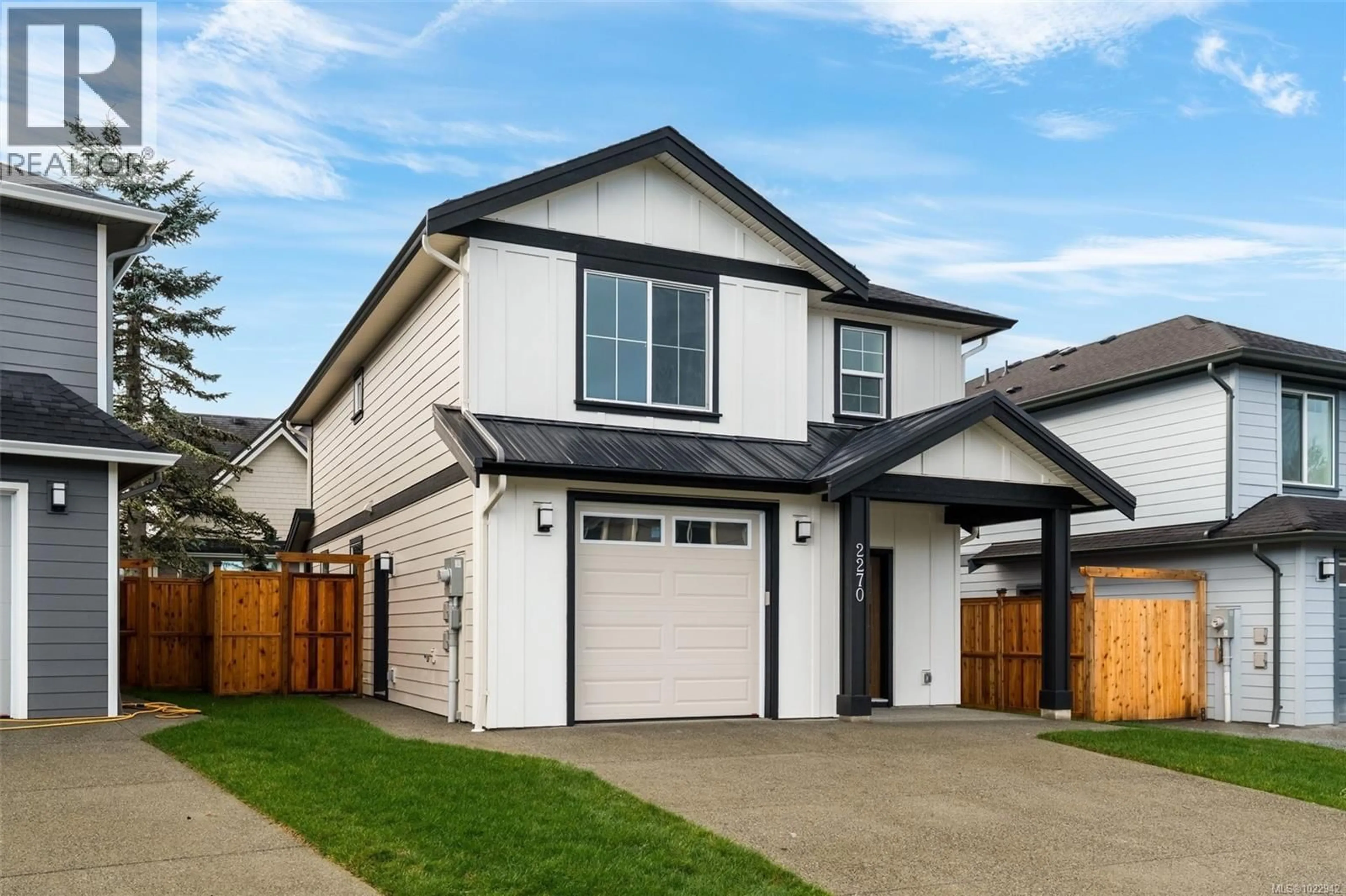 Home with vinyl exterior material, street for 2270 EVELYN LANE, Sooke British Columbia V9Z0W3