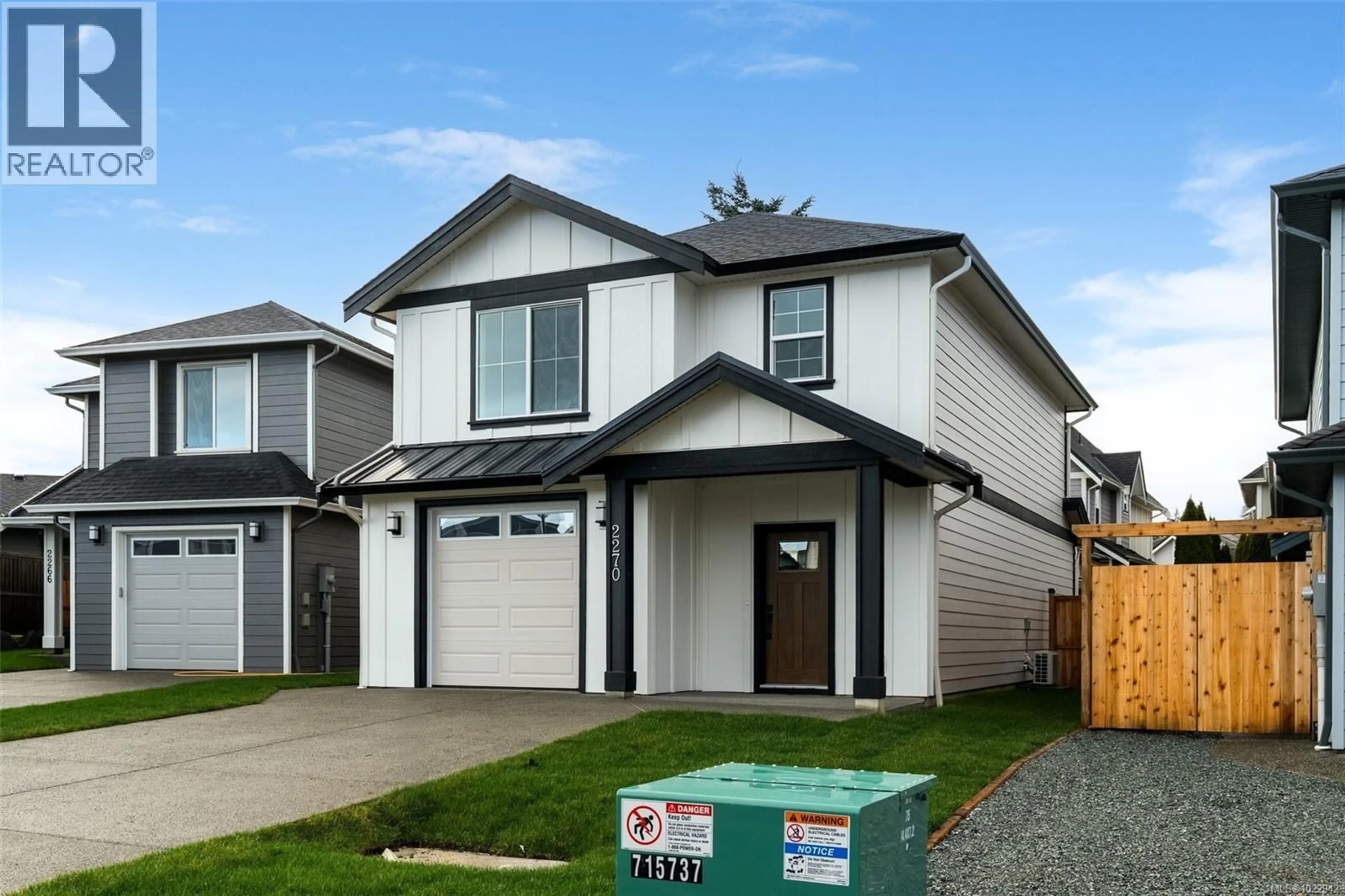 Home with vinyl exterior material, street for 2270 EVELYN LANE, Sooke British Columbia V9Z0W3