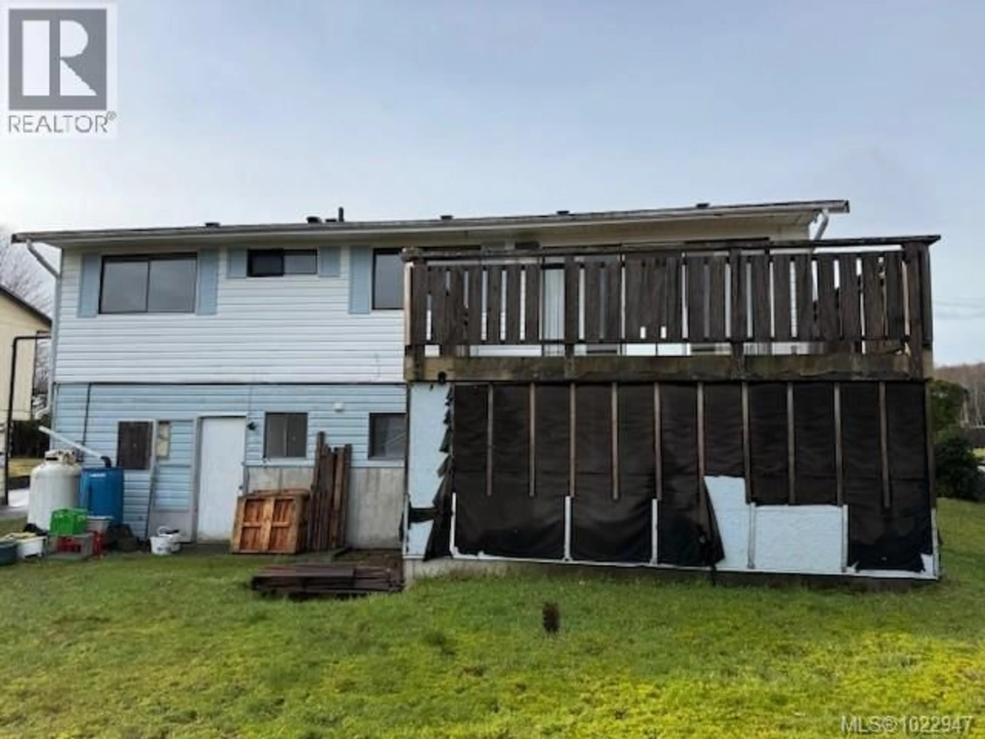 A pic from outside/outdoor area/front of a property/back of a property/a pic from drone, unknown for 7595 CARNARVON ROAD, Port Hardy British Columbia V0N2P0