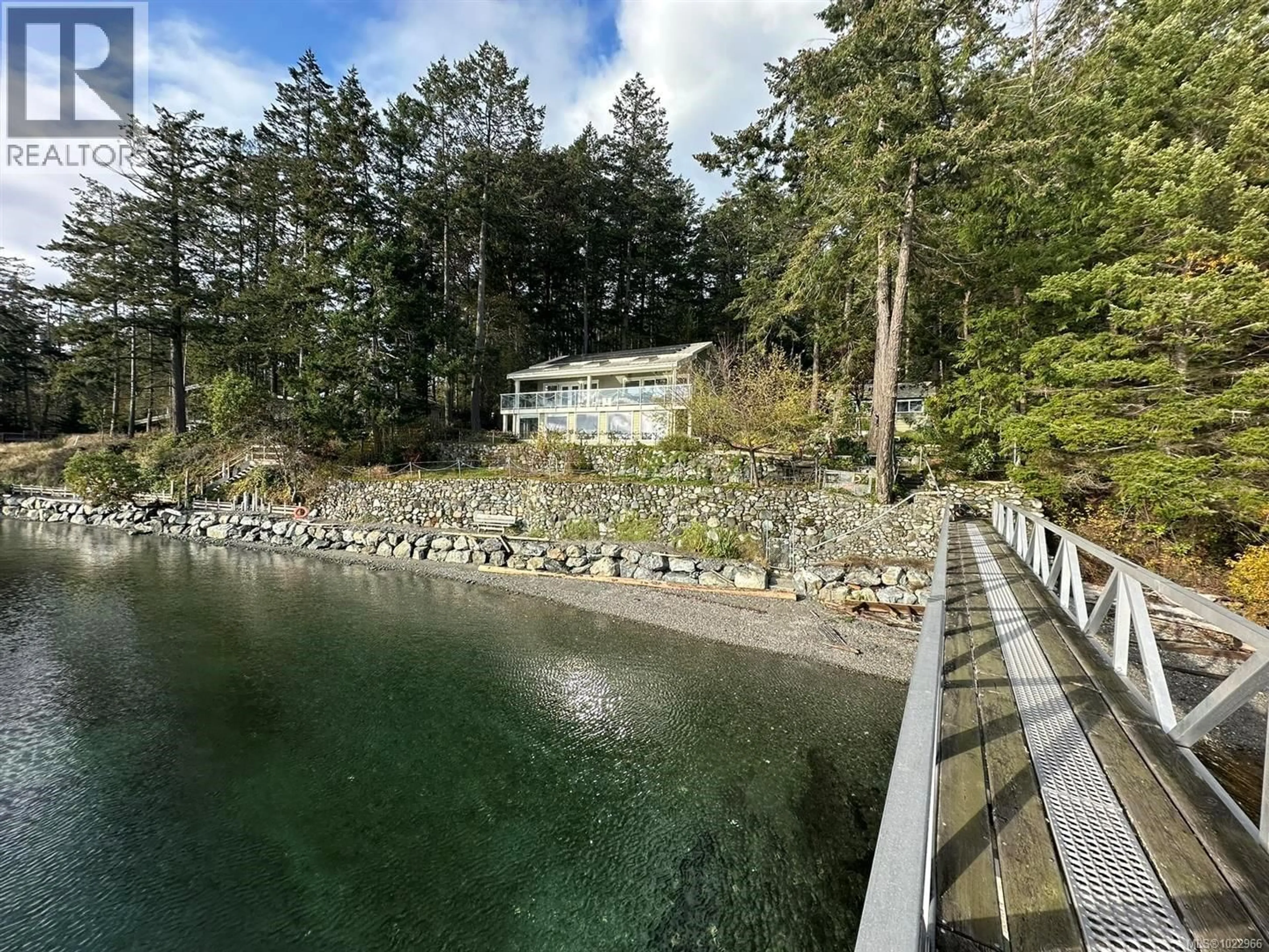 A pic from outside/outdoor area/front of a property/back of a property/a pic from drone, water/lake/river/ocean view for 10 MCKENZIE CRESCENT, Piers Island British Columbia V8L5Y7