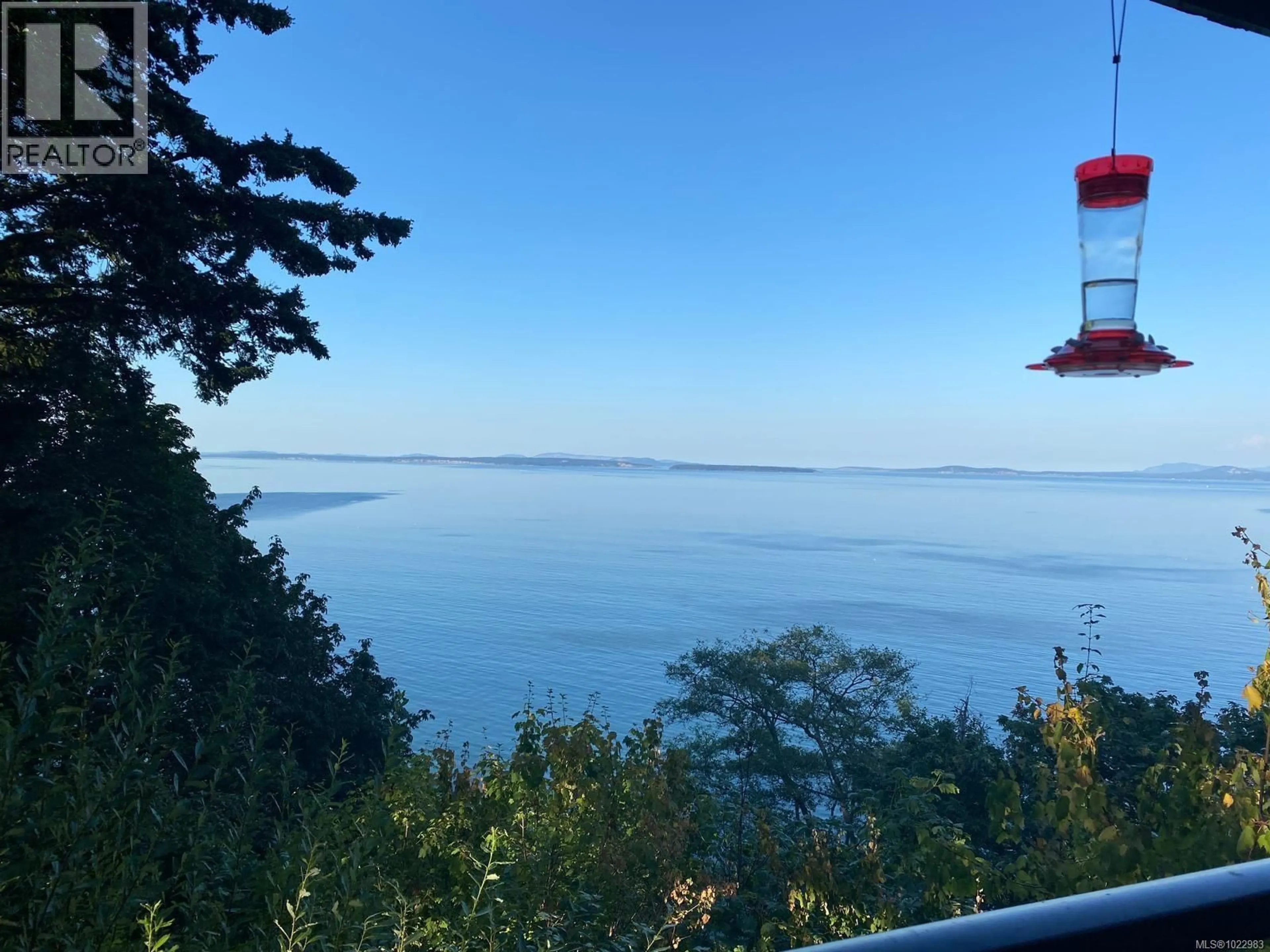 A pic from outside/outdoor area/front of a property/back of a property/a pic from drone, water/lake/river/ocean view for 4553 CORDOVA BAY ROAD, Saanich British Columbia V8X3V6