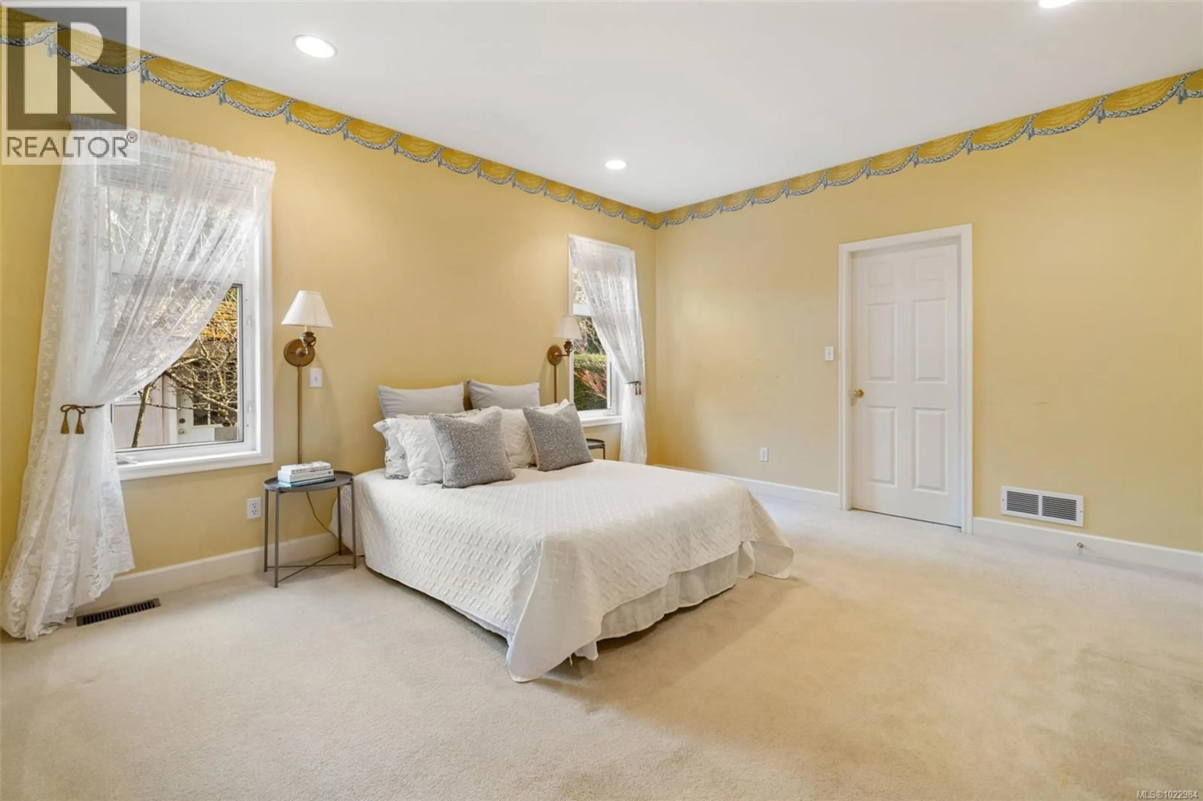 Bedroom with bed, carpet floor for 812 DEL MONTE LANE, Saanich British Columbia V8Y3H2