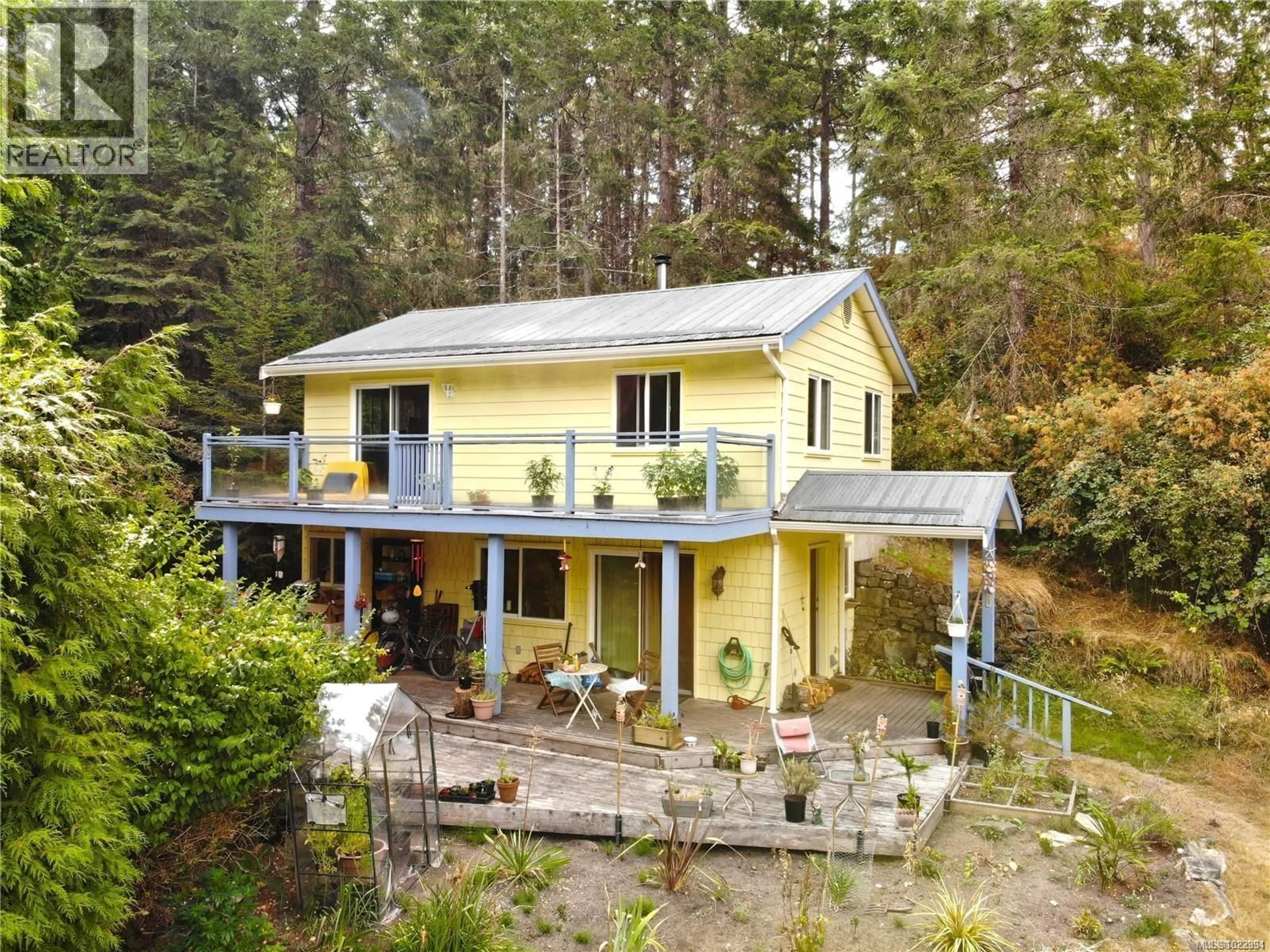 A pic from outside/outdoor area/front of a property/back of a property/a pic from drone, unknown for 121 WHIMS ROAD, Salt Spring British Columbia V8K1B2