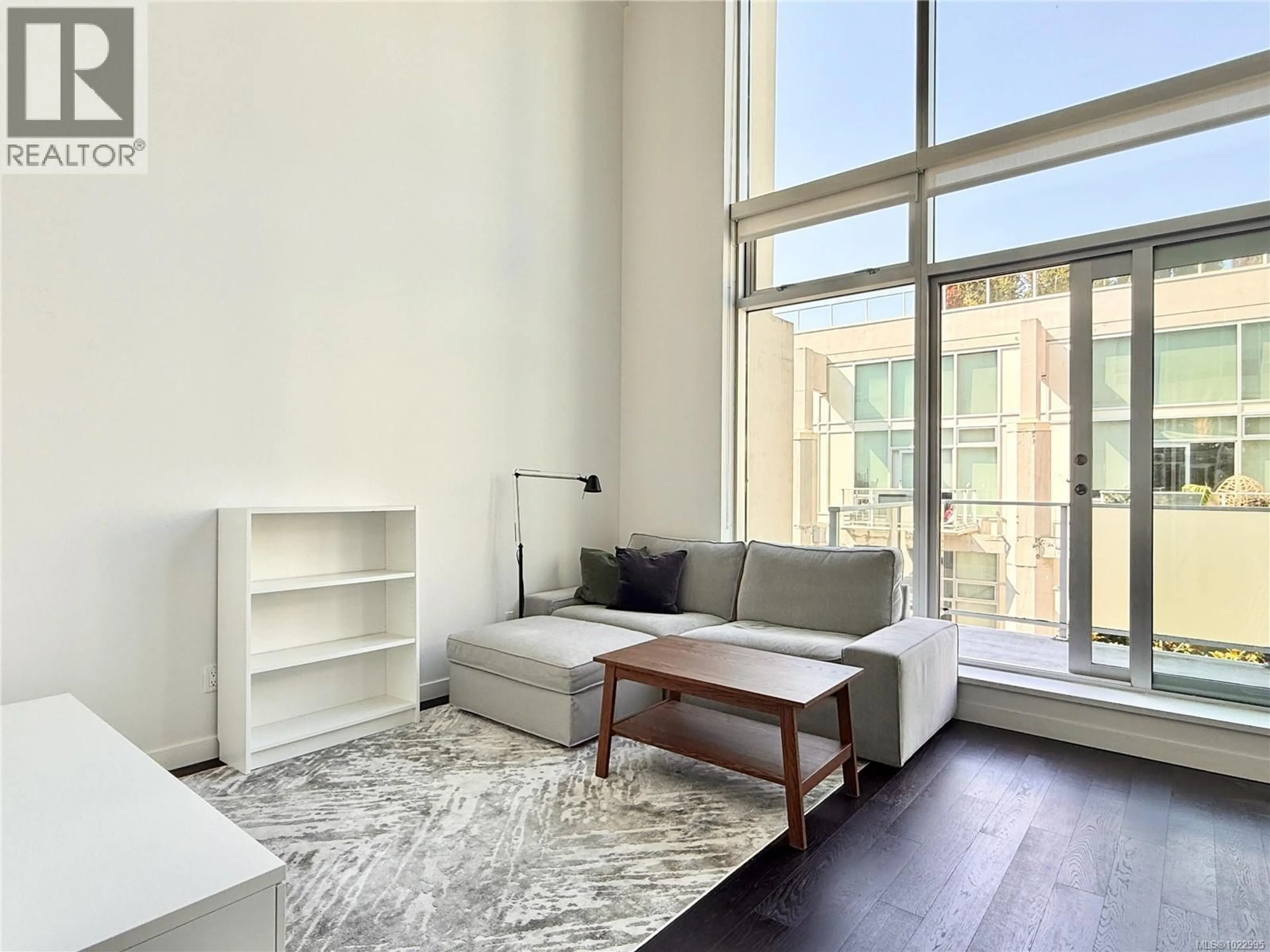 Living room with furniture, unknown for 438 - 770 FISGARD STREET, Victoria British Columbia V8W0B8