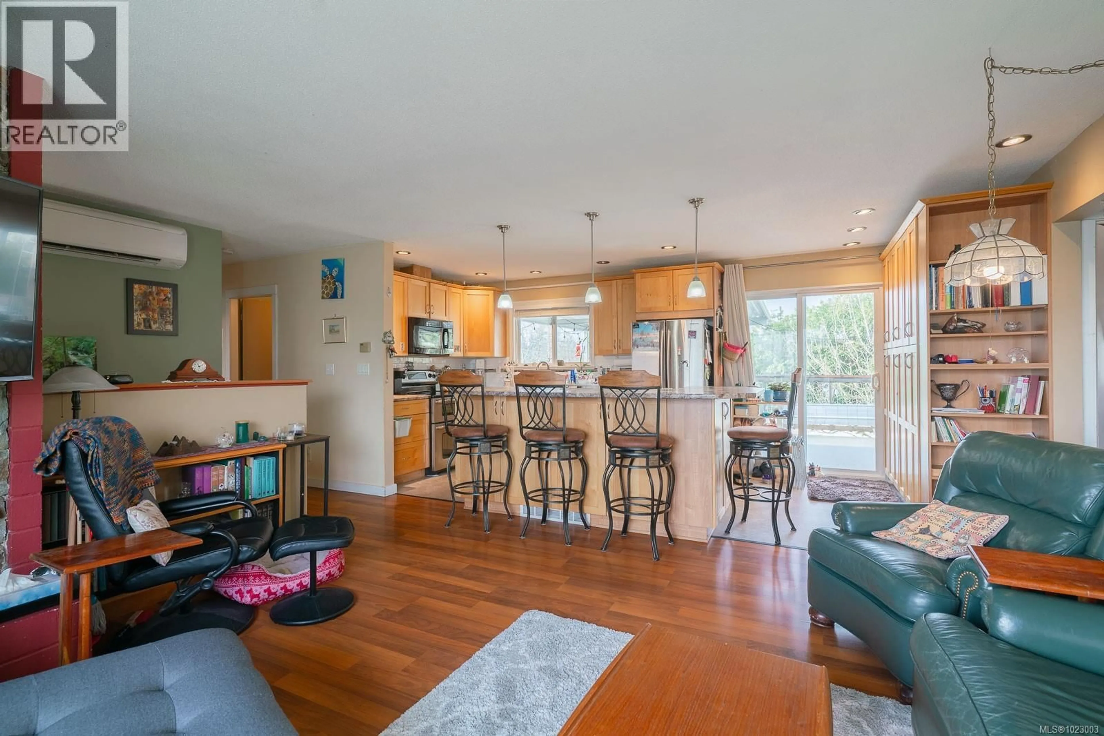 Open concept kitchen, wood/laminate floor for 6274 SOMENOS ROAD, Duncan British Columbia V9L4E9